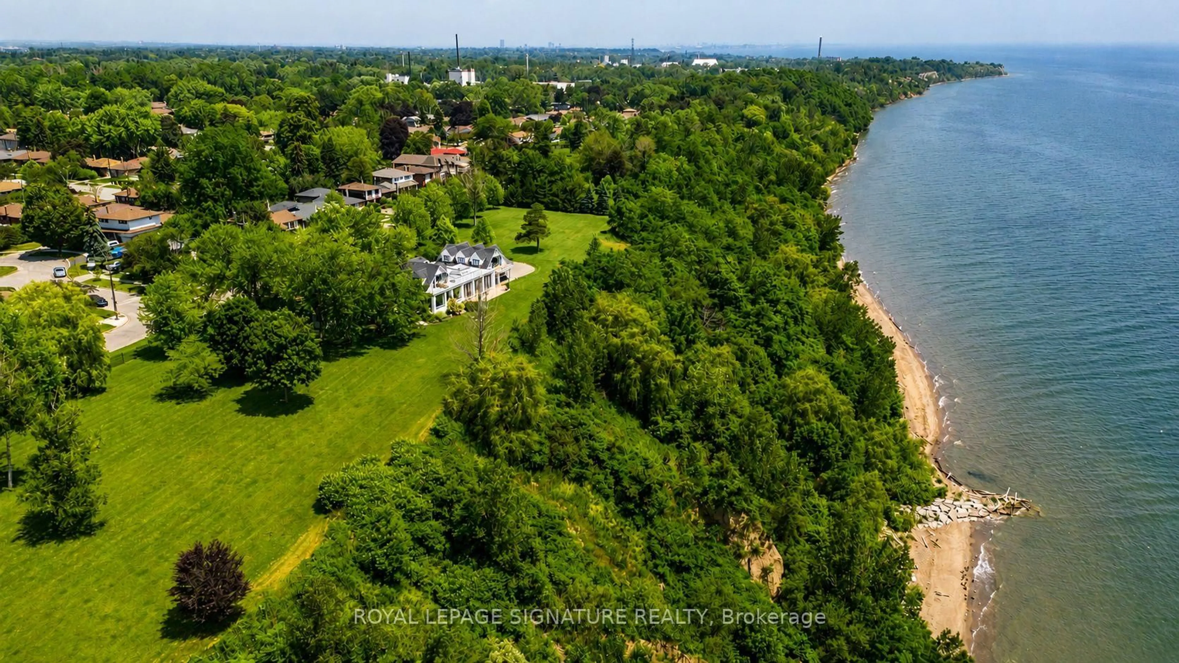 A pic from outside/outdoor area/front of a property/back of a property/a pic from drone, water/lake/river/ocean view for 220 Greyabbey Tr, Toronto Ontario M1E 1V9