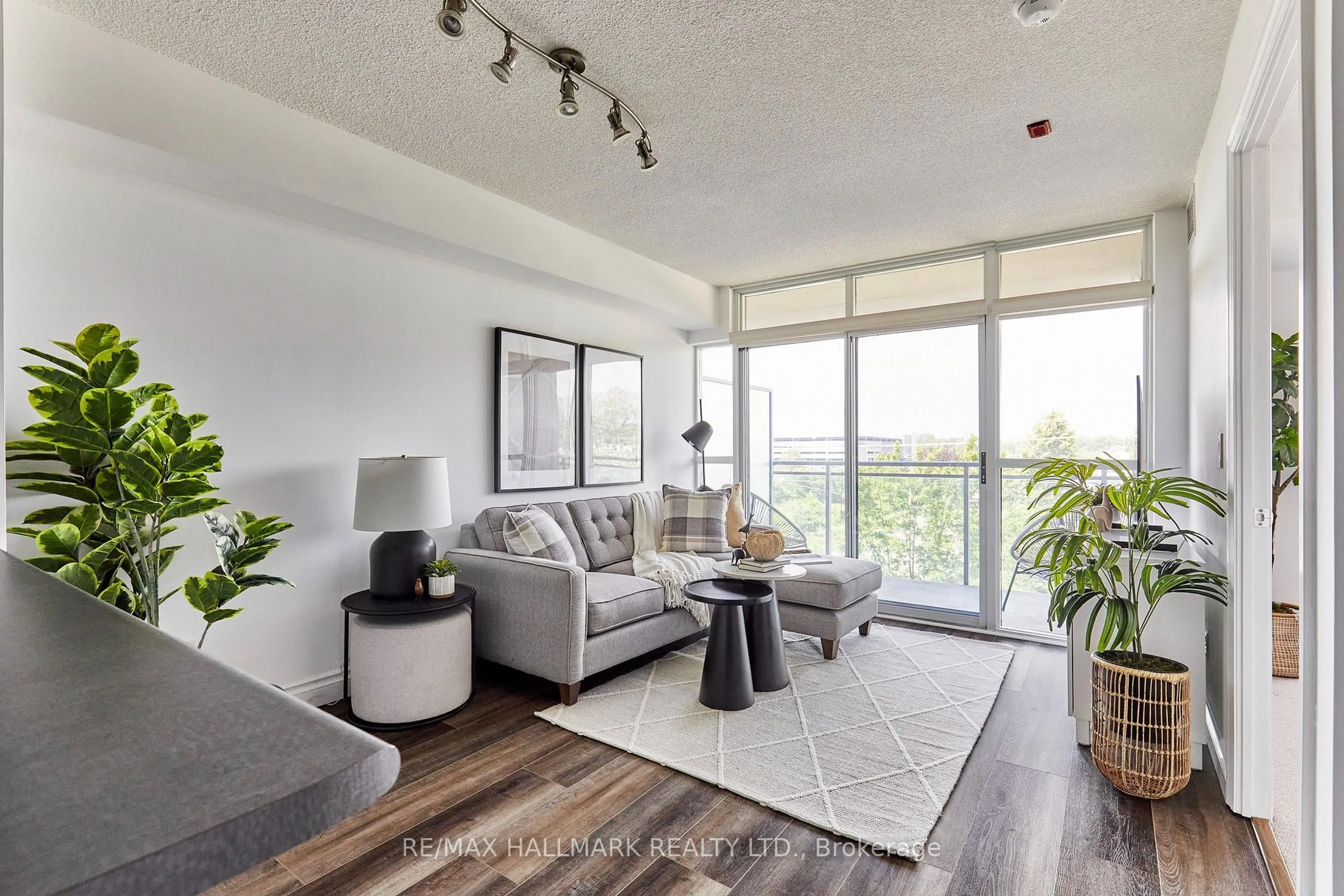 Living room with furniture, unknown for 1600 Charles St #410, Whitby Ontario L1N 0G4