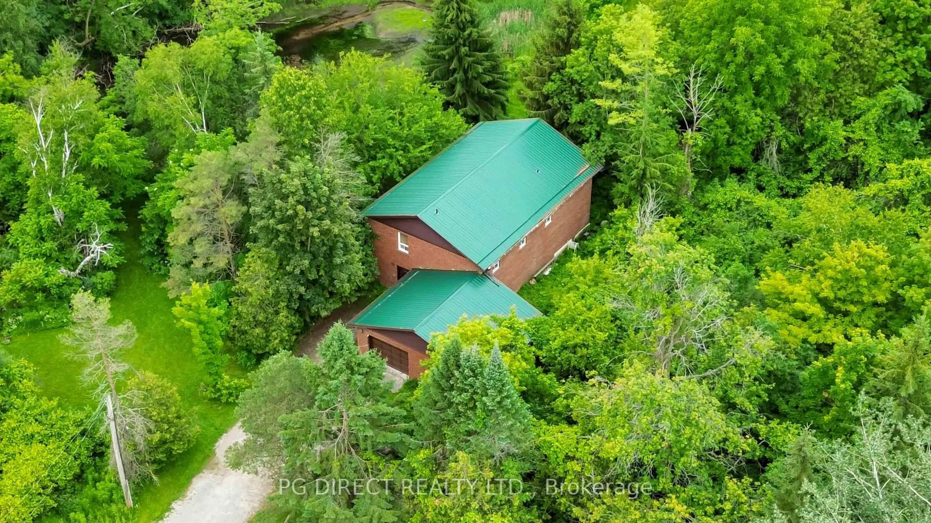 A pic from outside/outdoor area/front of a property/back of a property/a pic from drone, forest/trees view for 120 Aldred Dr, Scugog Ontario L9L 1B4