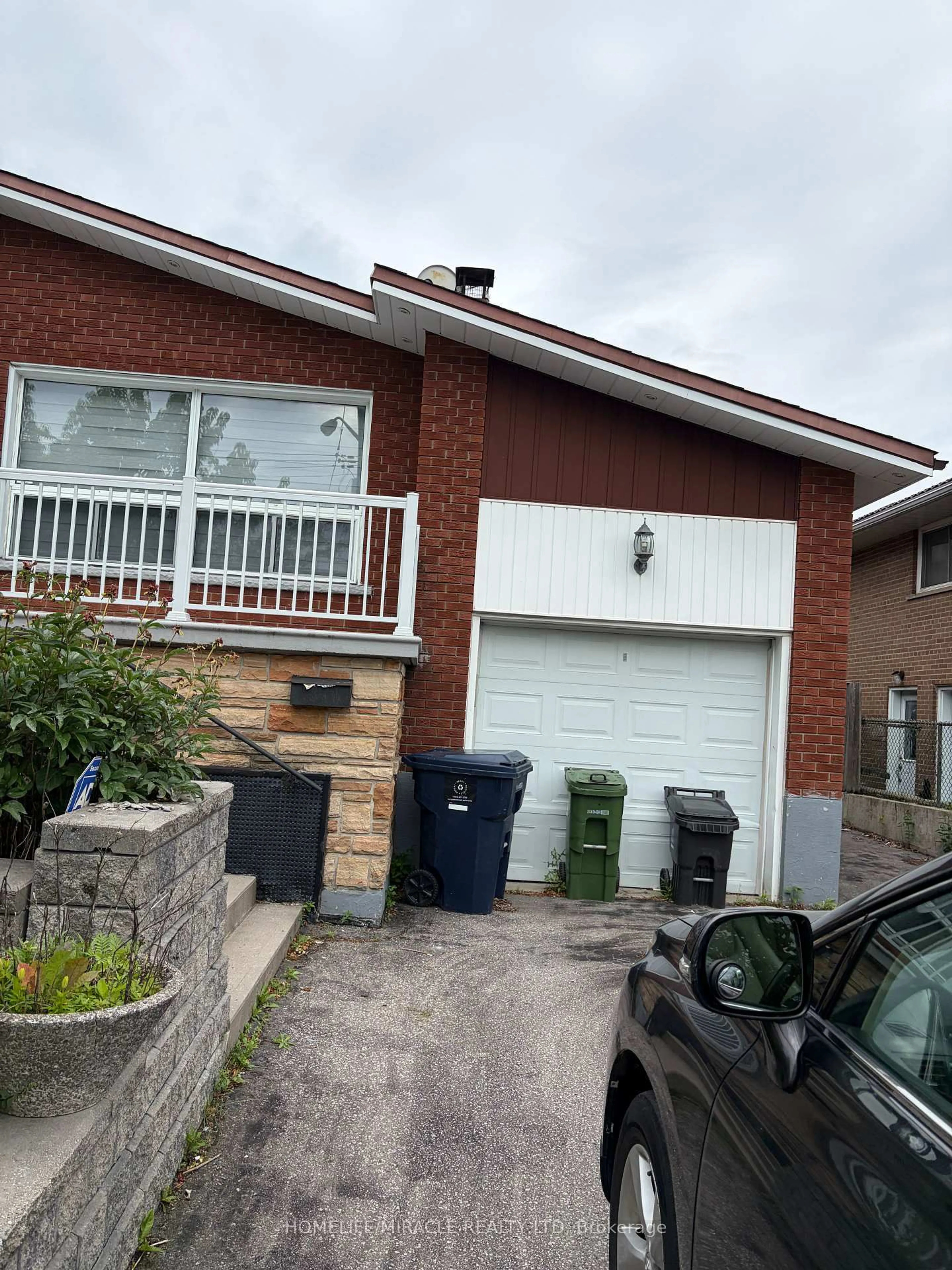 Home with brick exterior material, street for 1074 Midland Ave, Toronto Ontario M1K 4G9