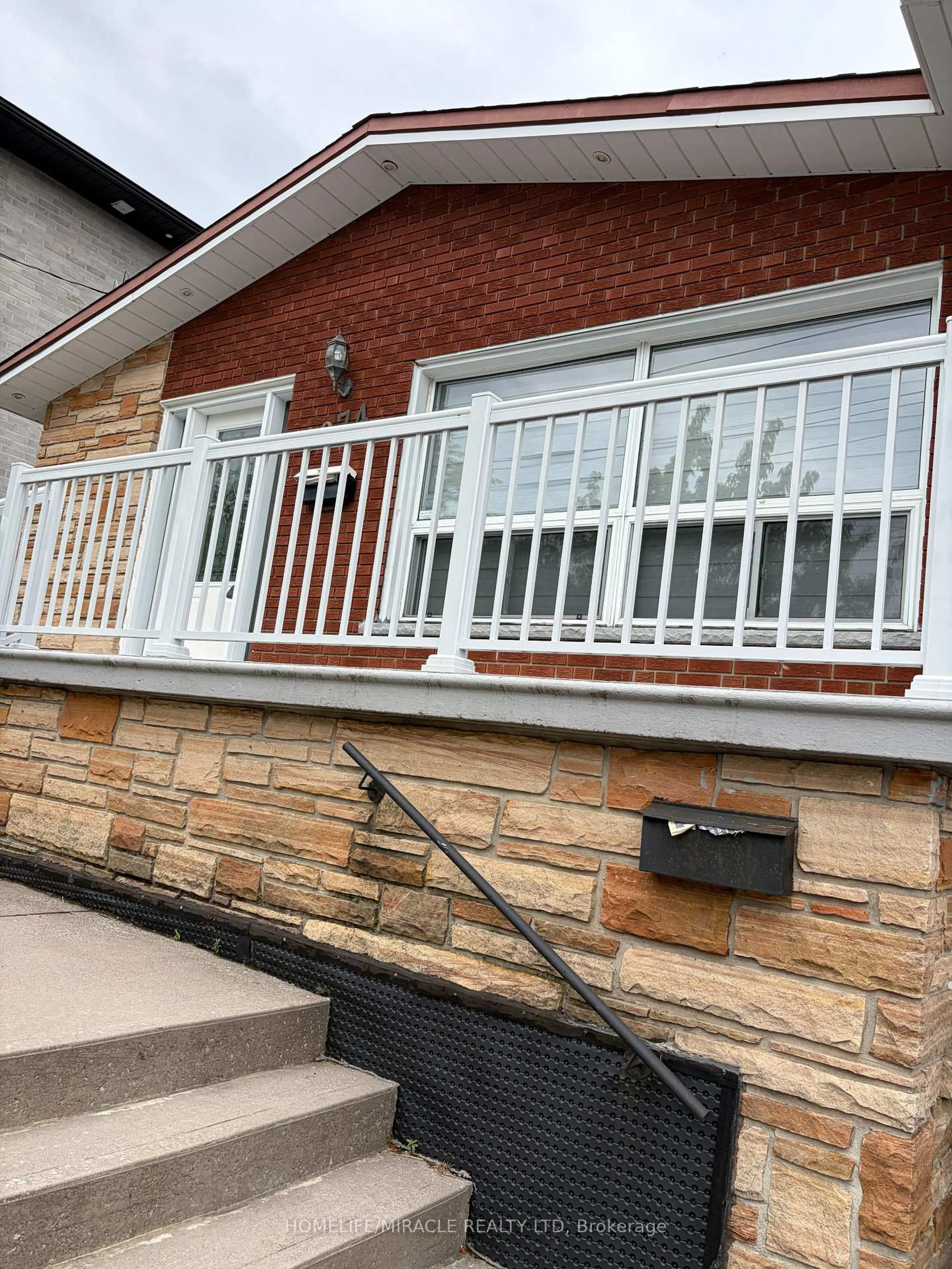 Home with brick exterior material, street for 1074 Midland Ave, Toronto Ontario M1K 4G9