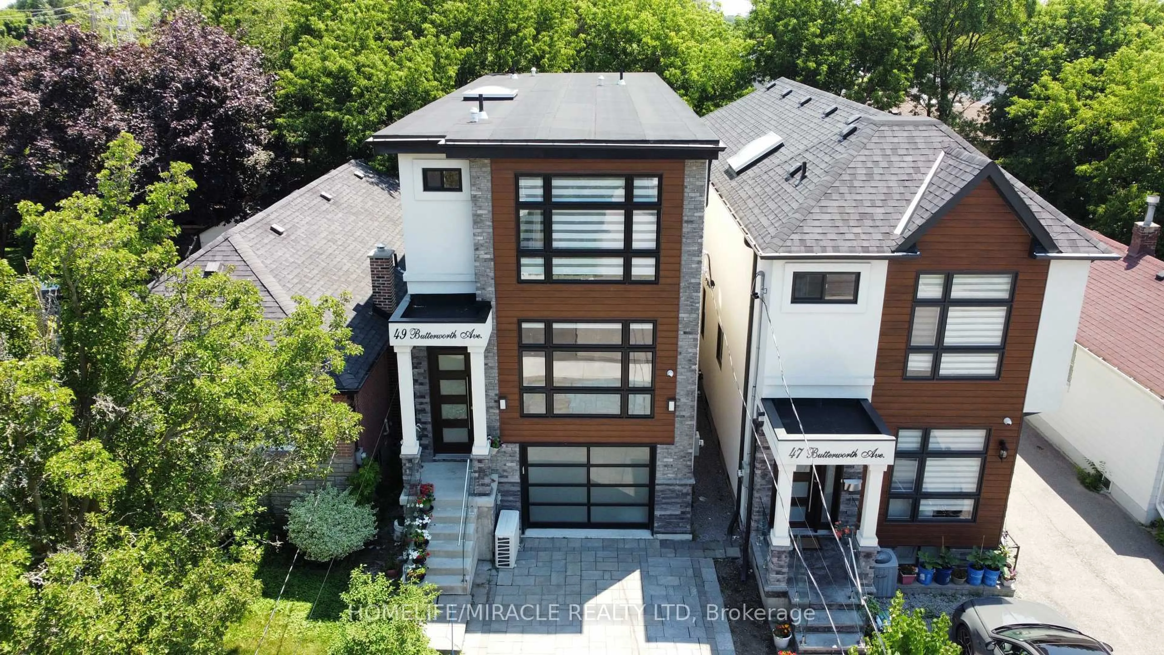 Home with brick exterior material, street for 49 Butterworth Ave, Toronto Ontario M1L 1H4