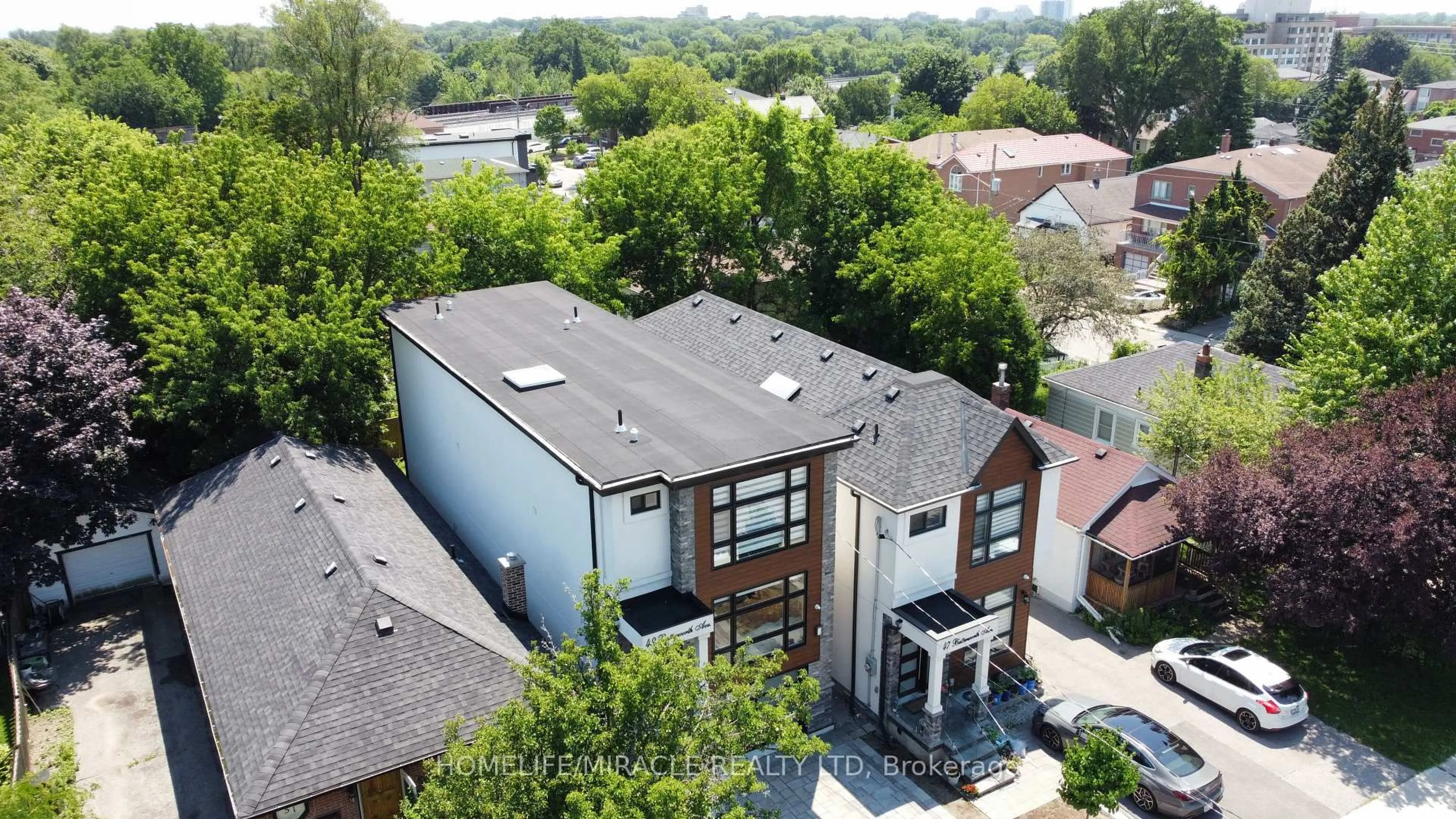 A pic from outside/outdoor area/front of a property/back of a property/a pic from drone, unknown for 49 Butterworth Ave, Toronto Ontario M1L 1H4