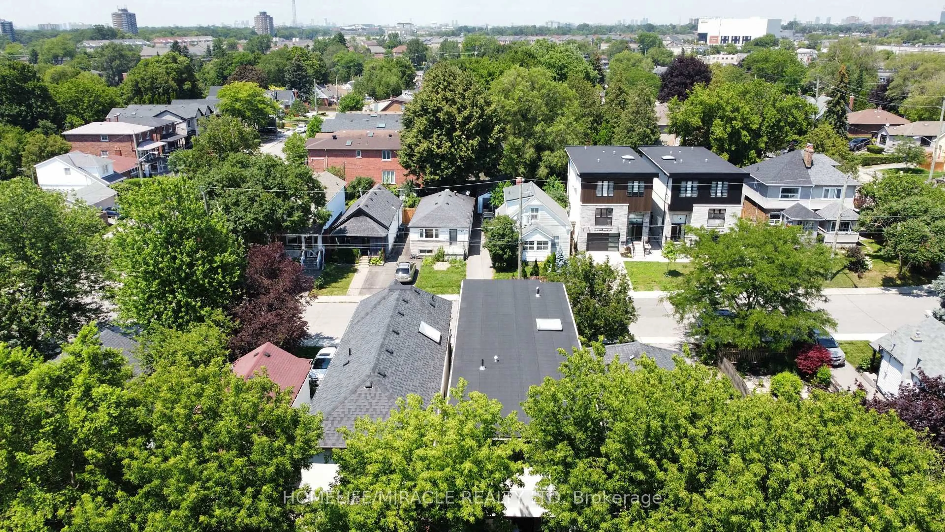 A pic from outside/outdoor area/front of a property/back of a property/a pic from drone, city buildings view from balcony for 49 Butterworth Ave, Toronto Ontario M1L 1H4