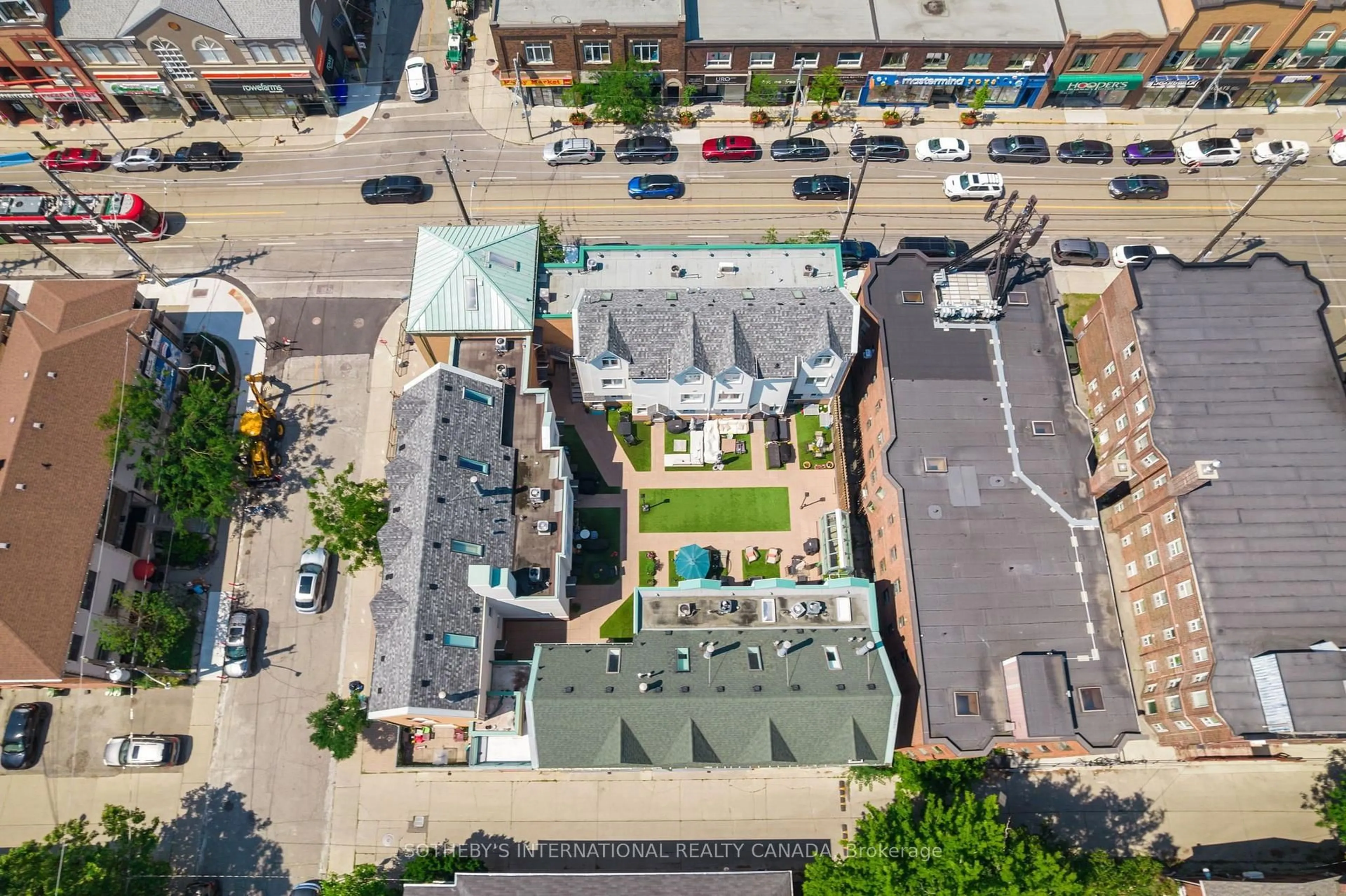 A pic from outside/outdoor area/front of a property/back of a property/a pic from drone, street for 101 Hammersmith Ave #210, Toronto Ontario M4E 2W3