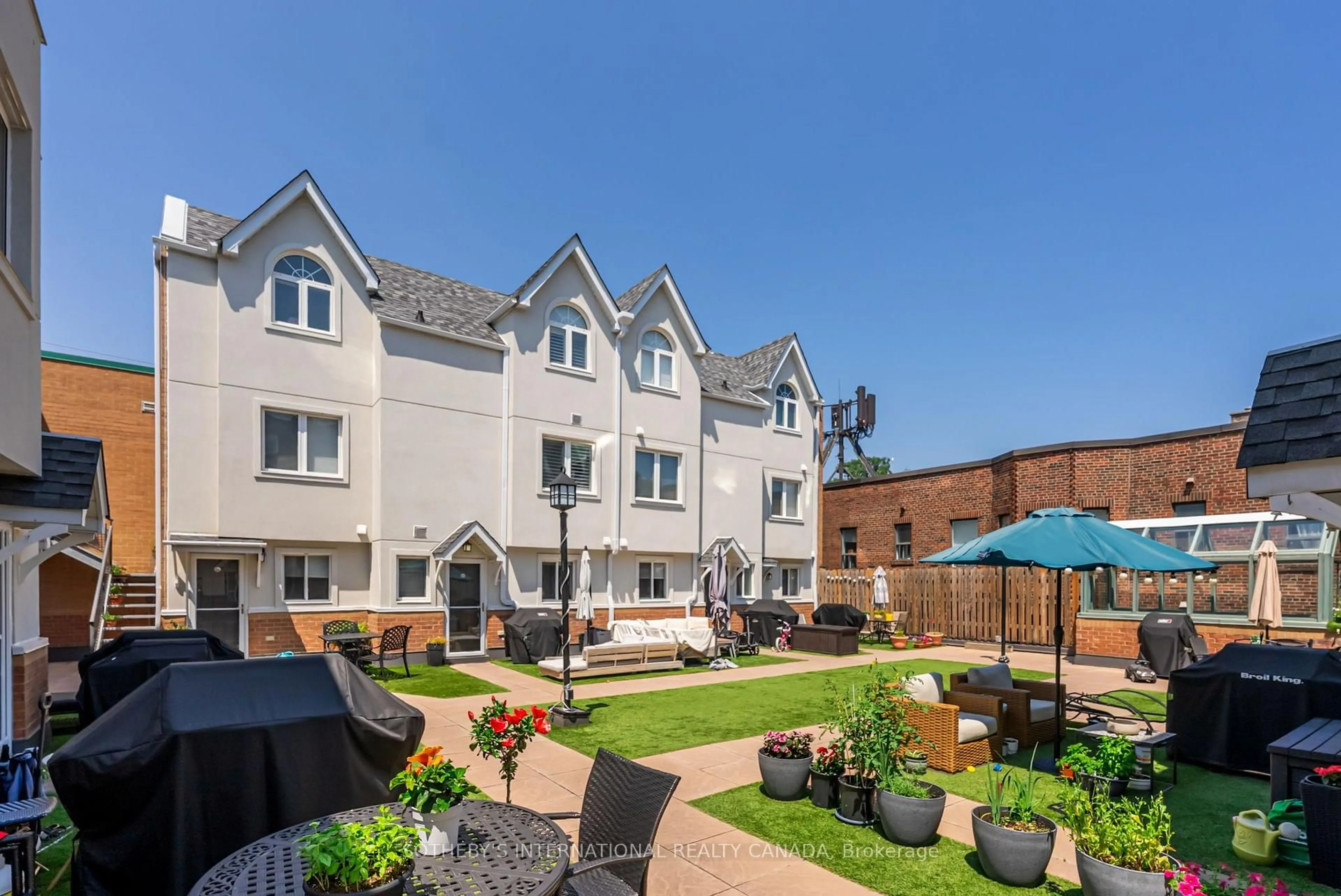 A pic from outside/outdoor area/front of a property/back of a property/a pic from drone, street for 101 Hammersmith Ave #210, Toronto Ontario M4E 2W3