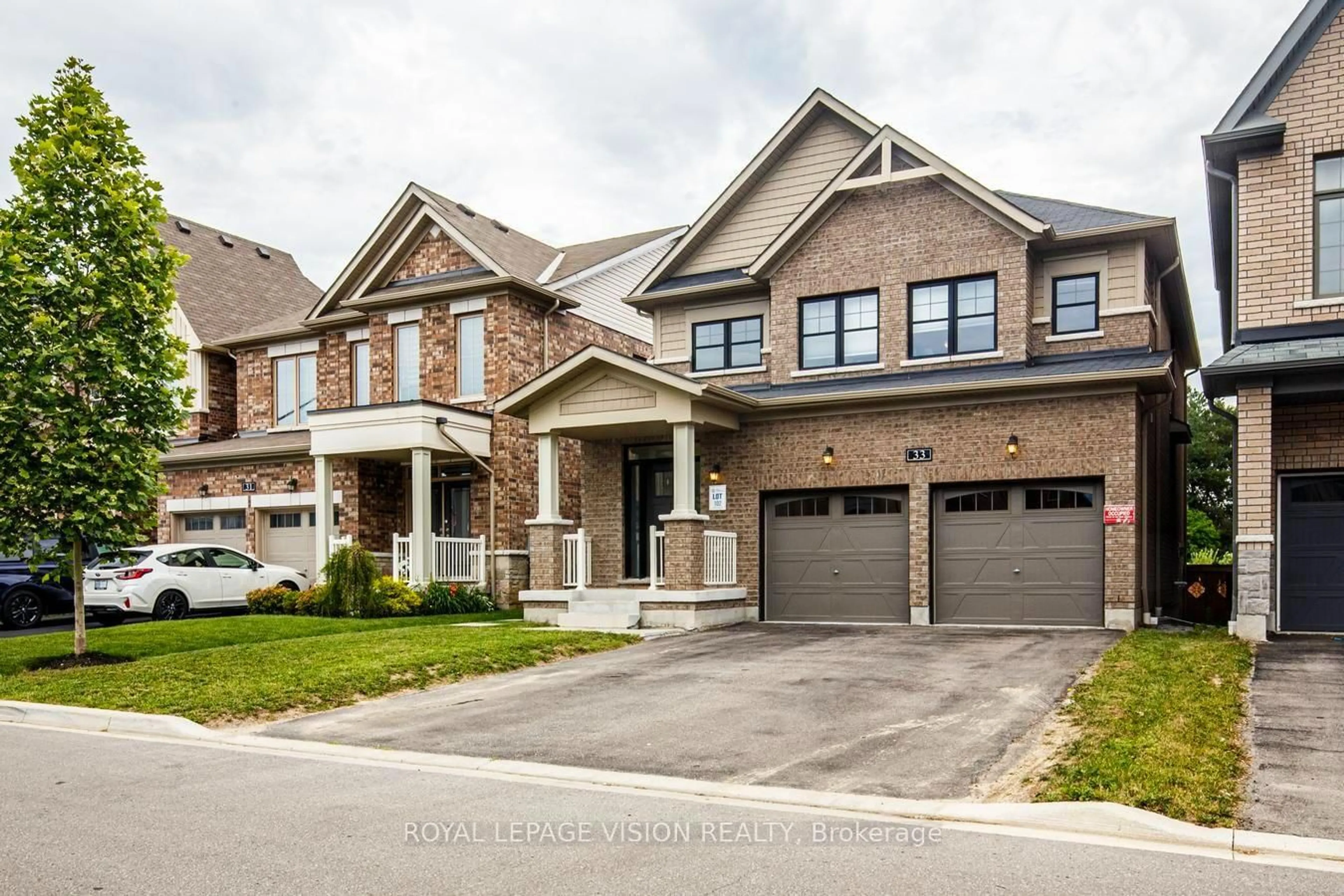 Home with brick exterior material, street for 33 Bremner St, Whitby Ontario L1R 1W5