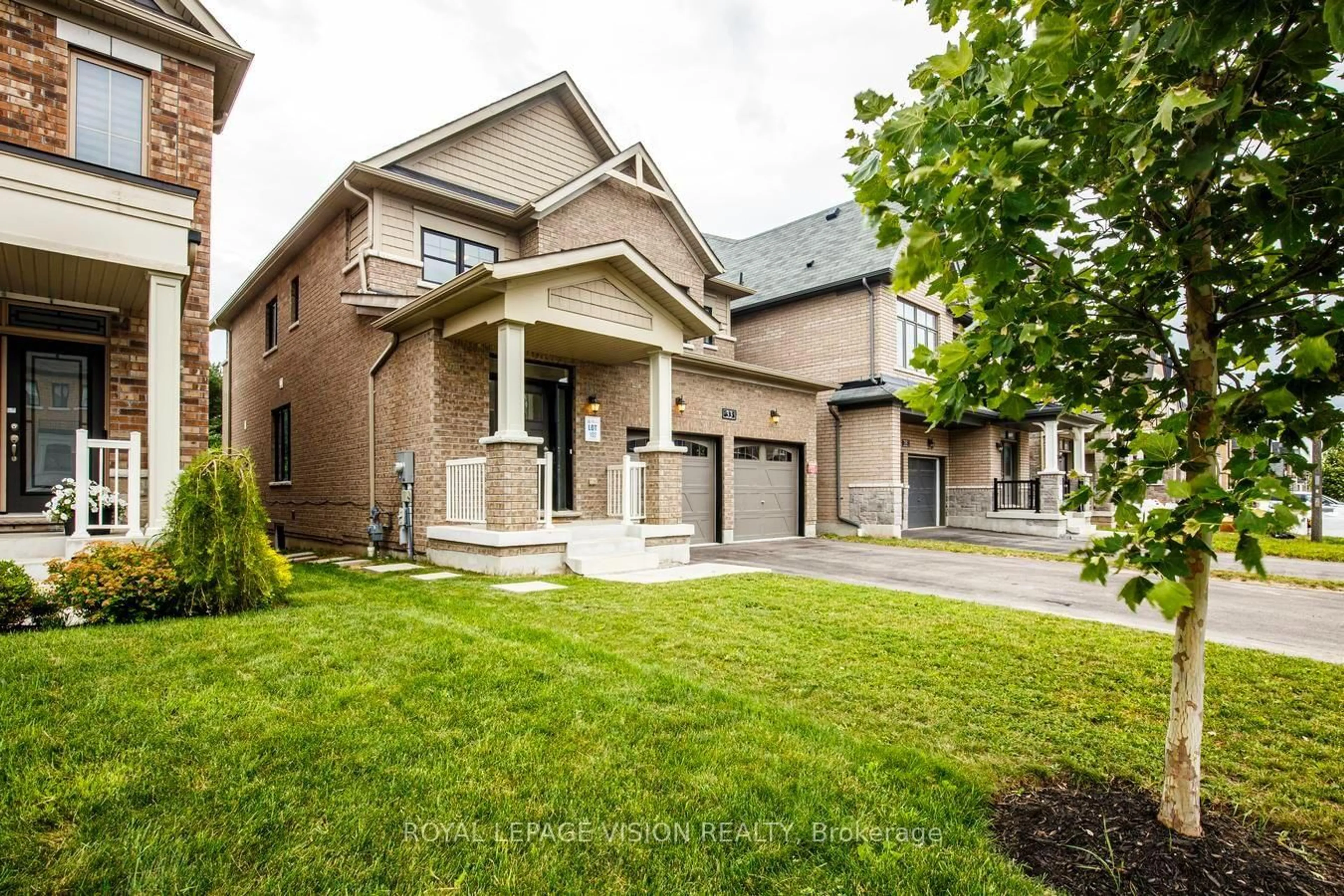 Home with brick exterior material, street for 33 Bremner St, Whitby Ontario L1R 1W5