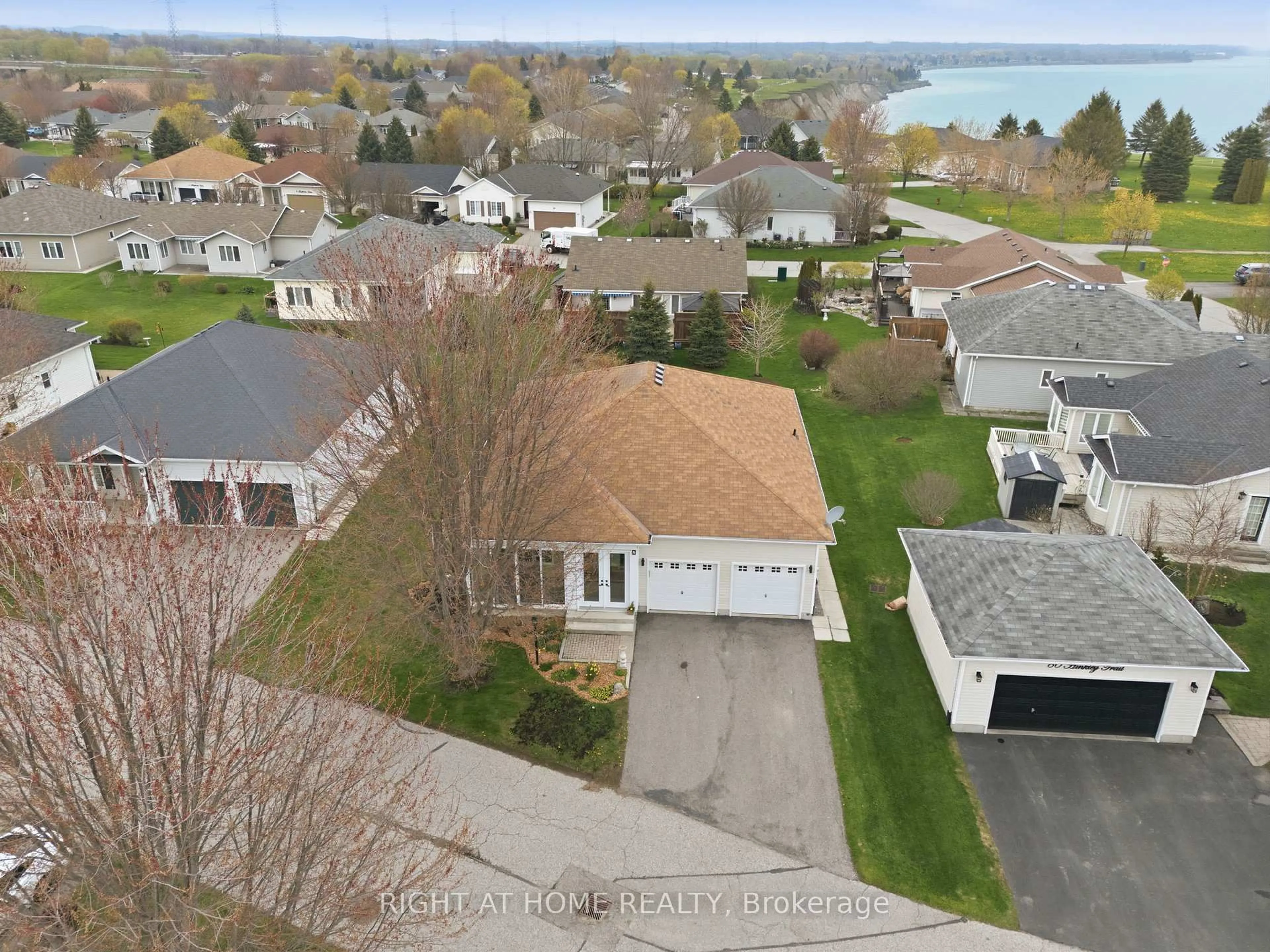 A pic from outside/outdoor area/front of a property/back of a property/a pic from drone, water/lake/river/ocean view for 5 Park Place Lane, Clarington Ontario L1B 0B2