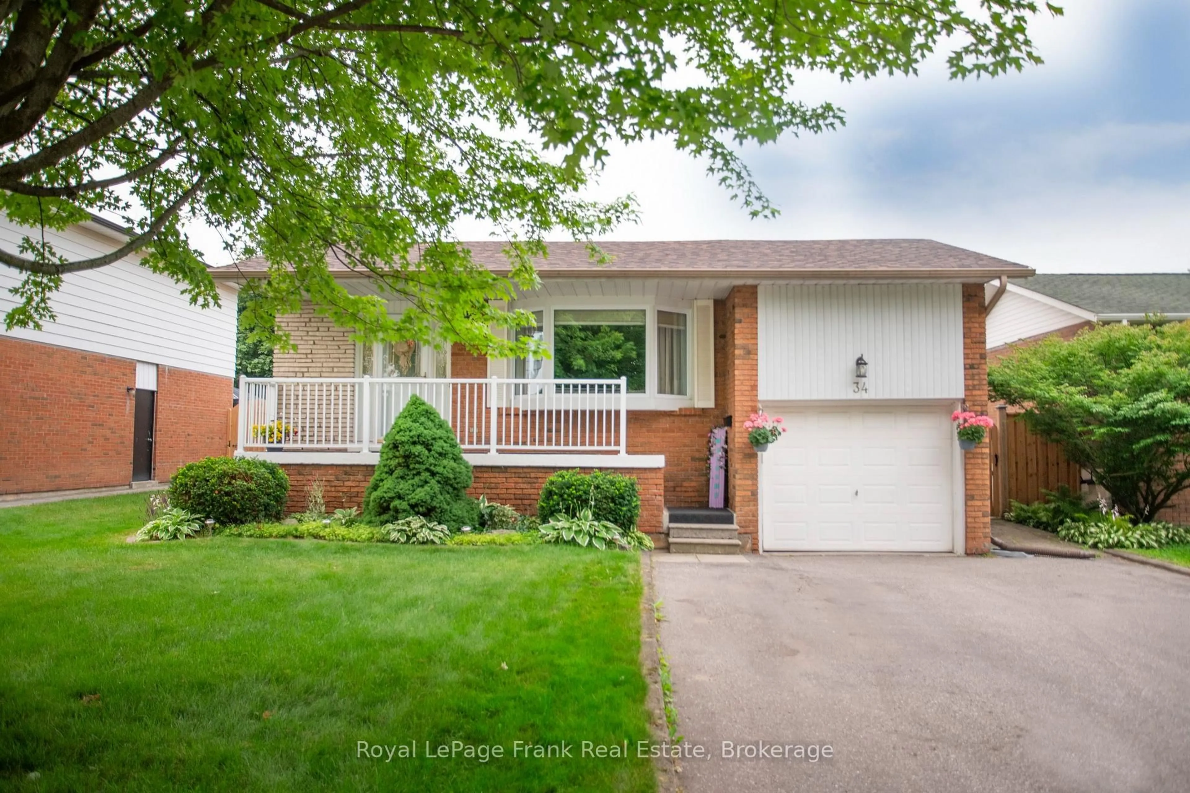 Home with brick exterior material, street for 34 Baker Rd, Ajax Ontario L1S 2T8