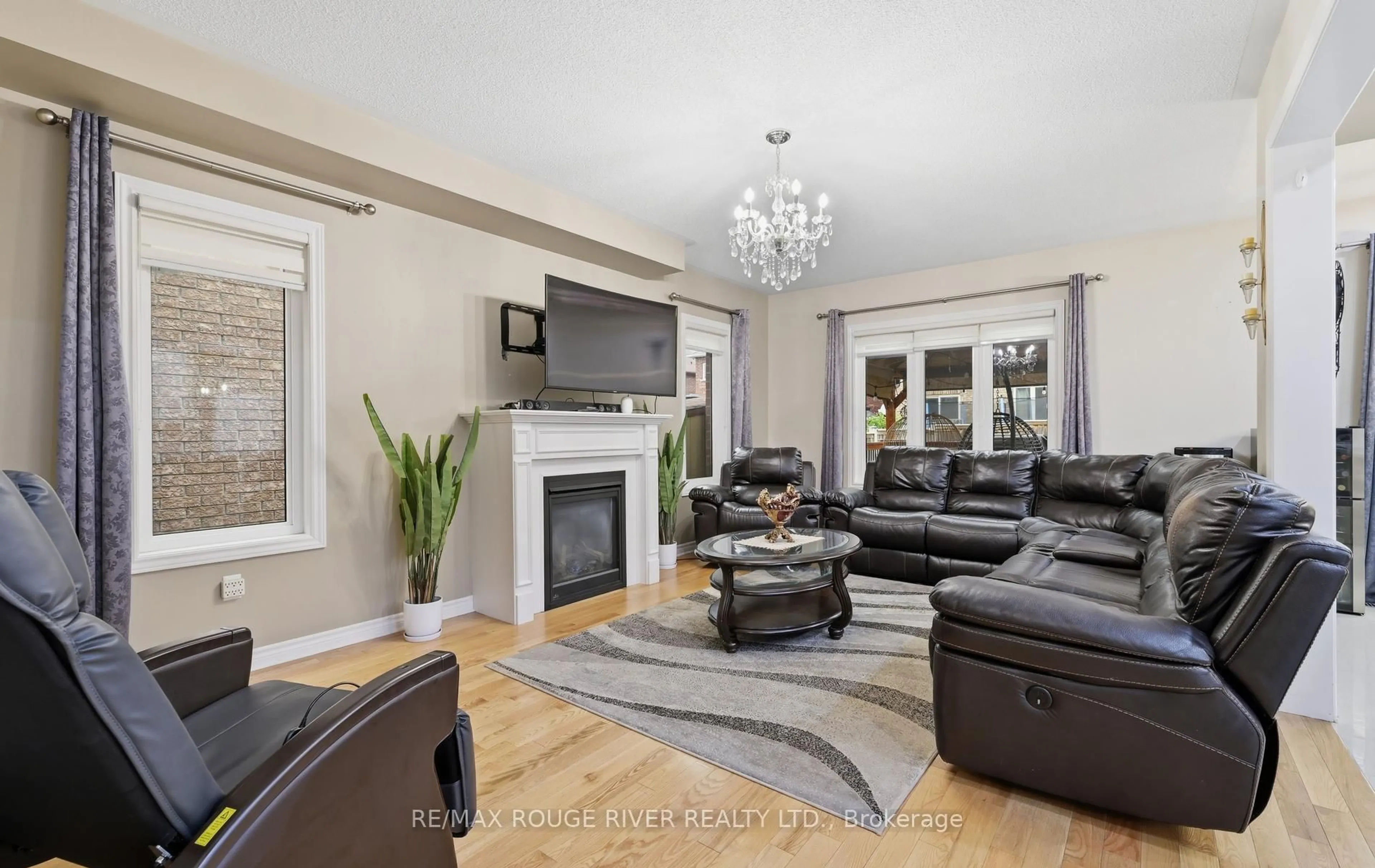 Living room with furniture, wood/laminate floor for 886 Groveland Ave, Oshawa Ontario L1K 0W1