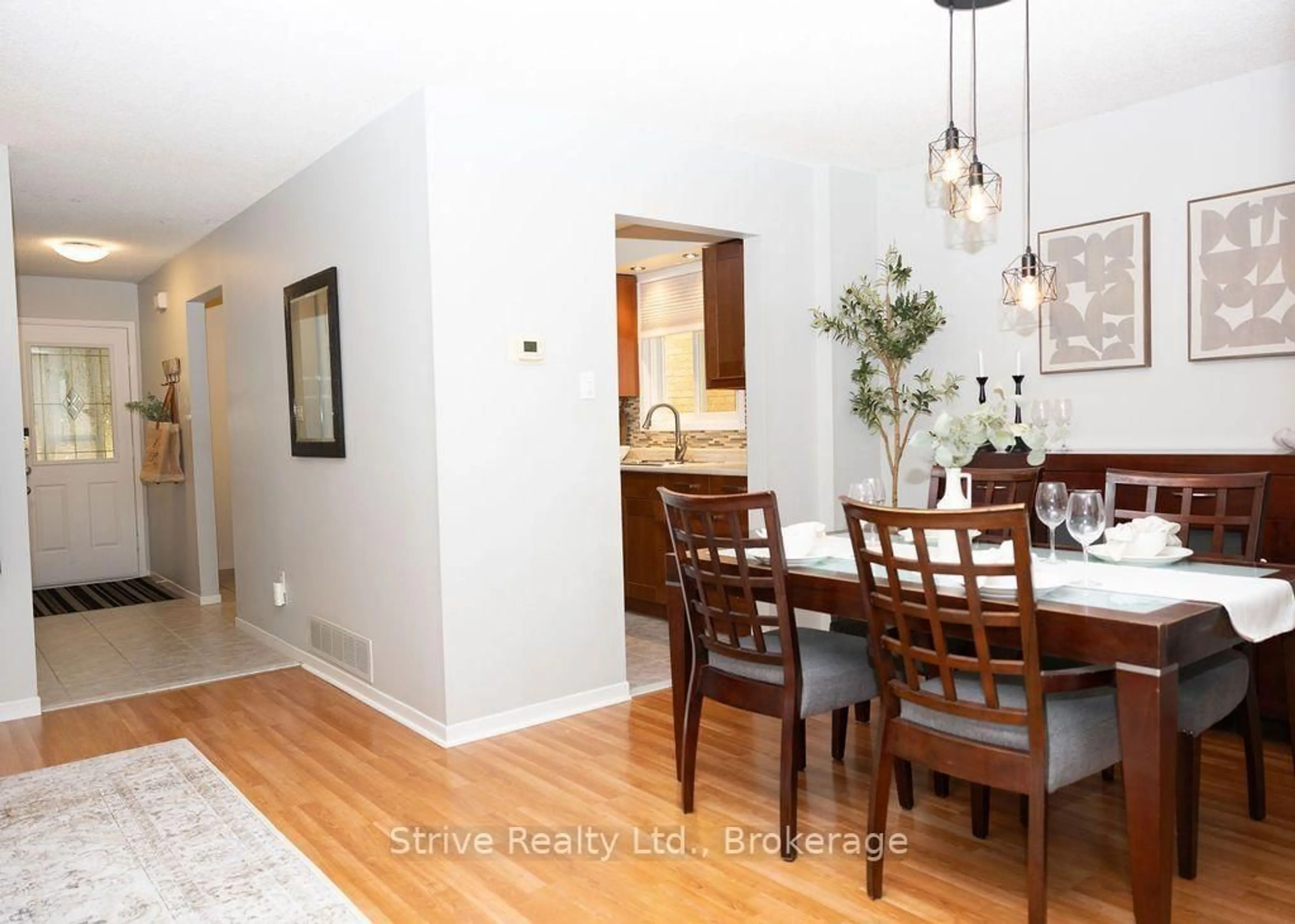Dining room, wood/laminate floor for 54 Deverill Cres, Ajax Ontario L1T 1S7