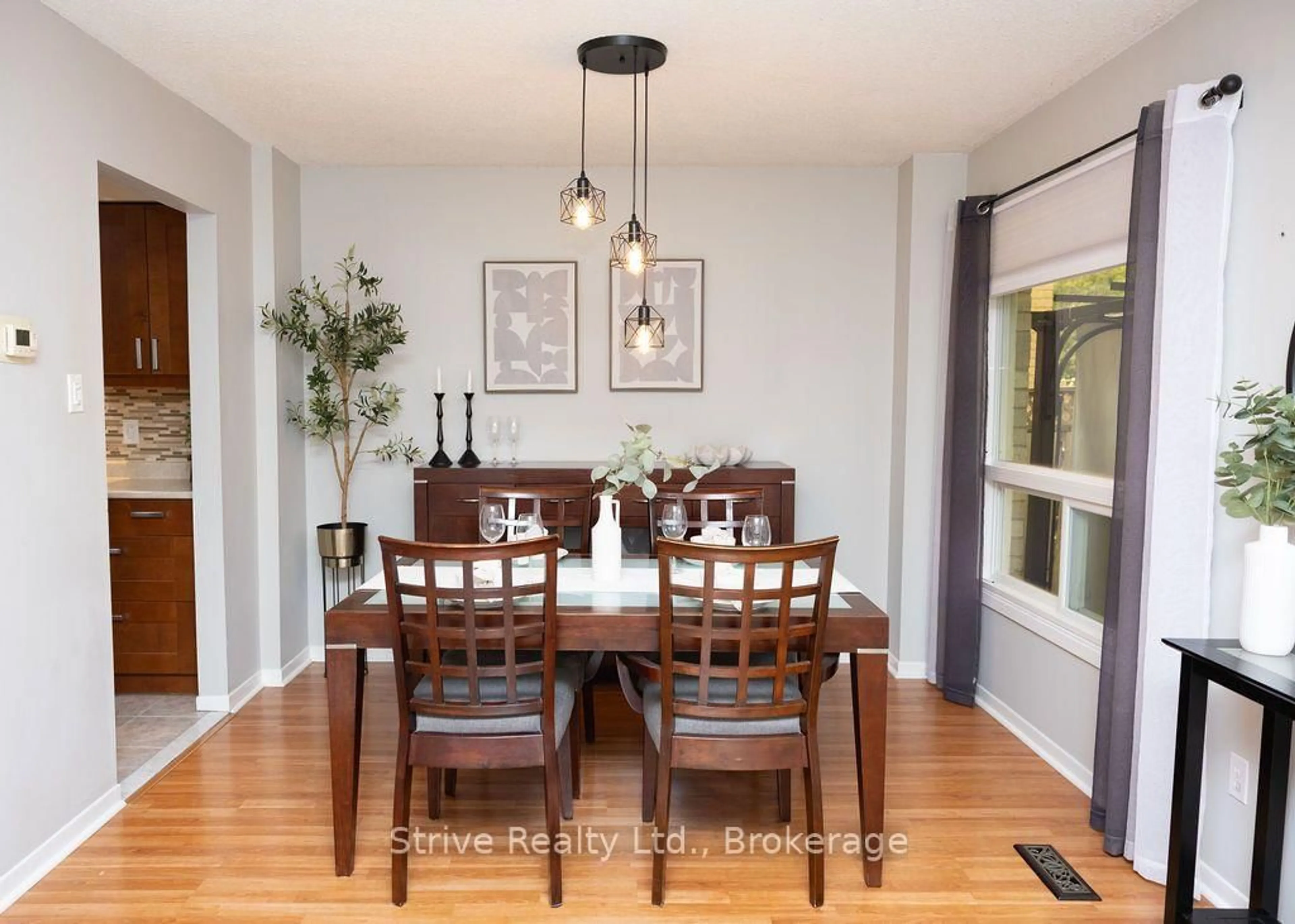 Dining room, wood/laminate floor for 54 Deverill Cres, Ajax Ontario L1T 1S7