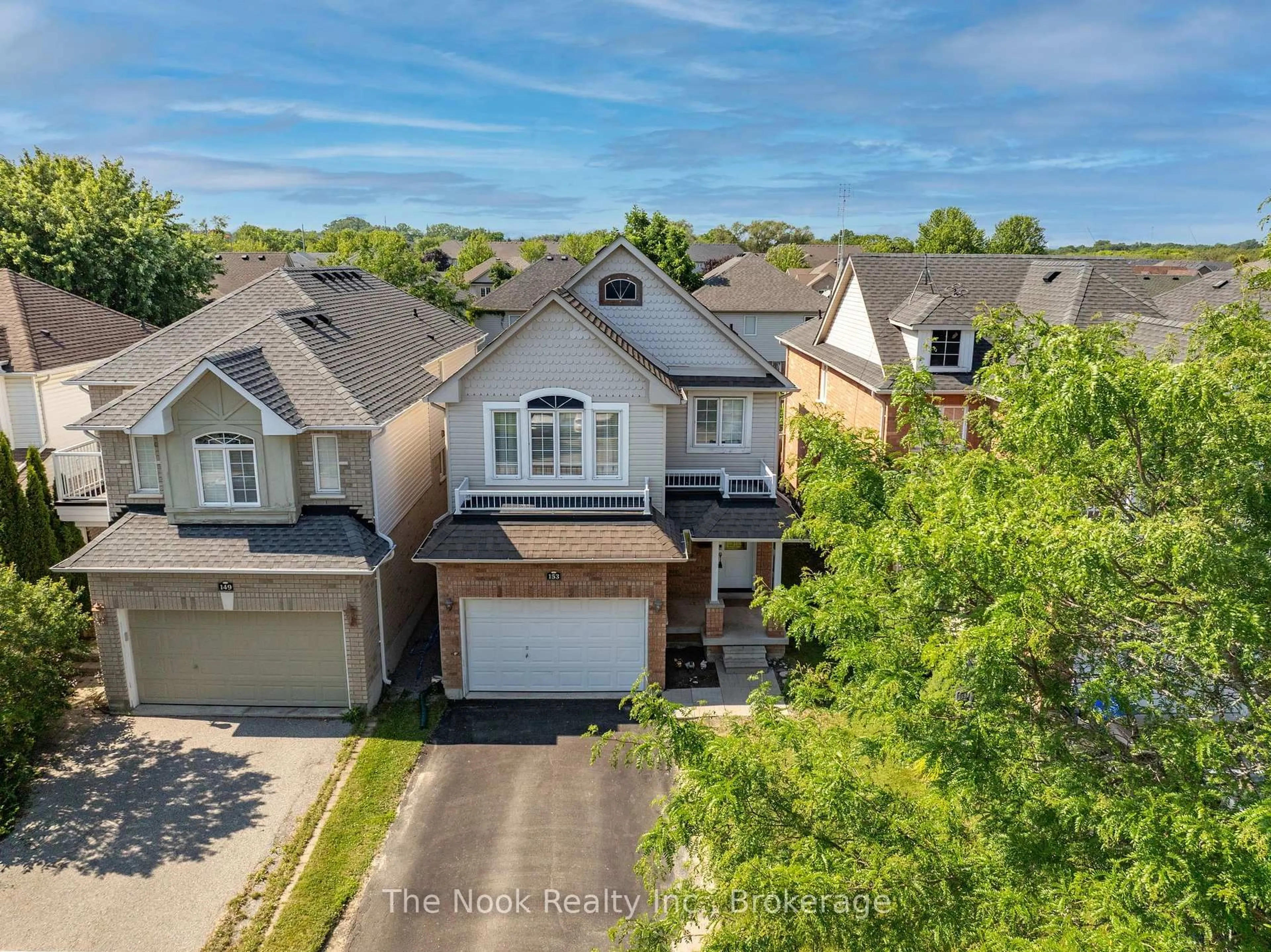 A pic from outside/outdoor area/front of a property/back of a property/a pic from drone, street for 153 Madden Pl, Clarington Ontario L1C 5K4