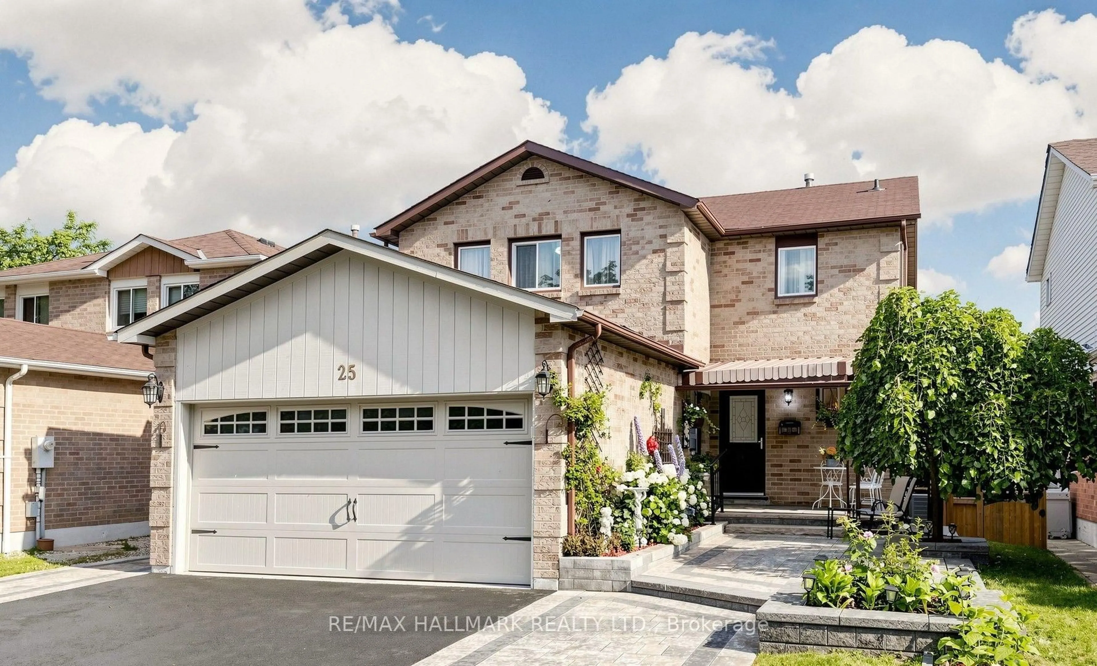 Home with brick exterior material, street for 25 Wicks Dr, Ajax Ontario L1Z 1C5
