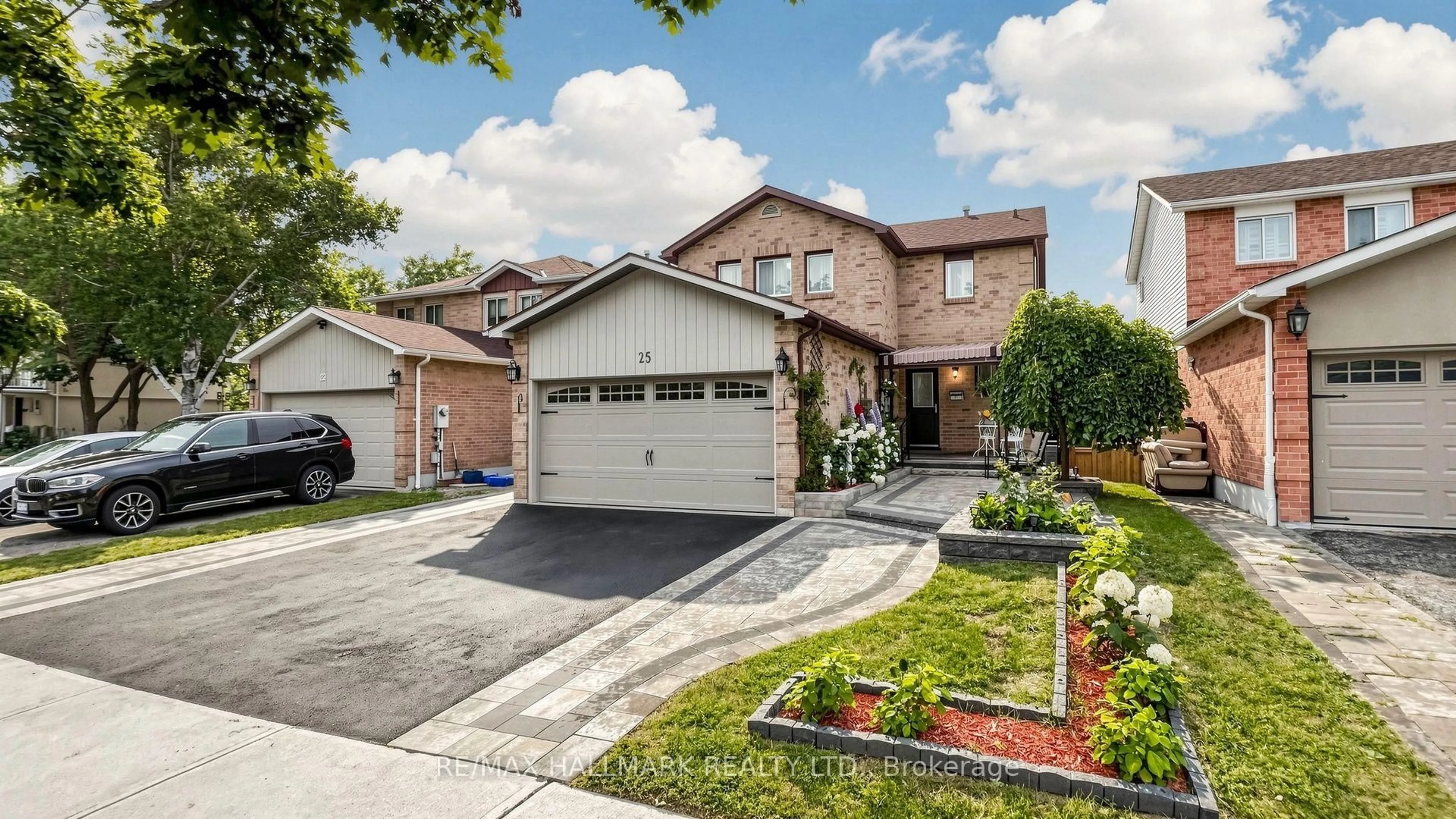 Home with brick exterior material, street for 25 Wicks Dr, Ajax Ontario L1Z 1C5