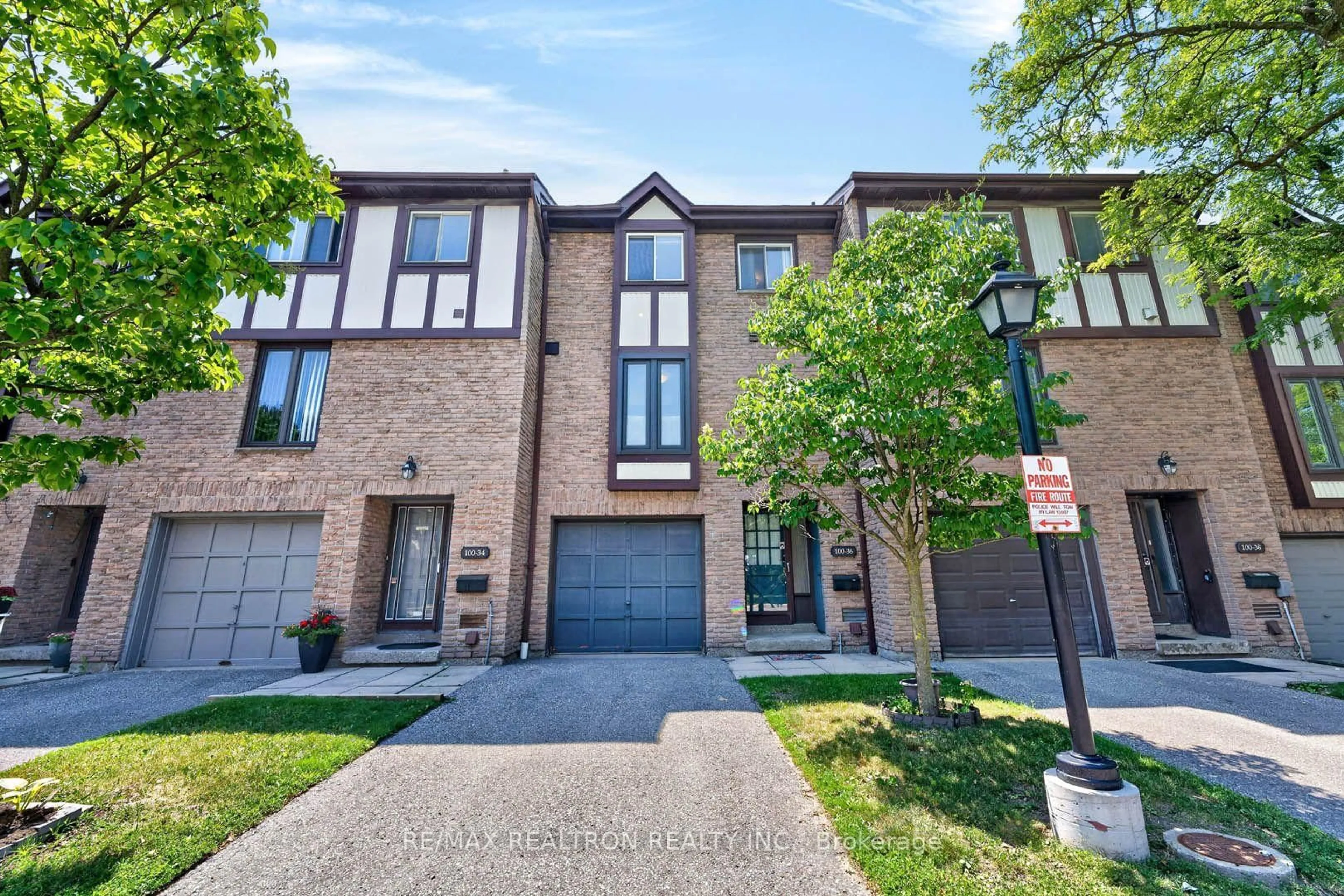 Home with brick exterior material, street for 100 Burrows Hall Blvd #36, Toronto Ontario M1B 1M7