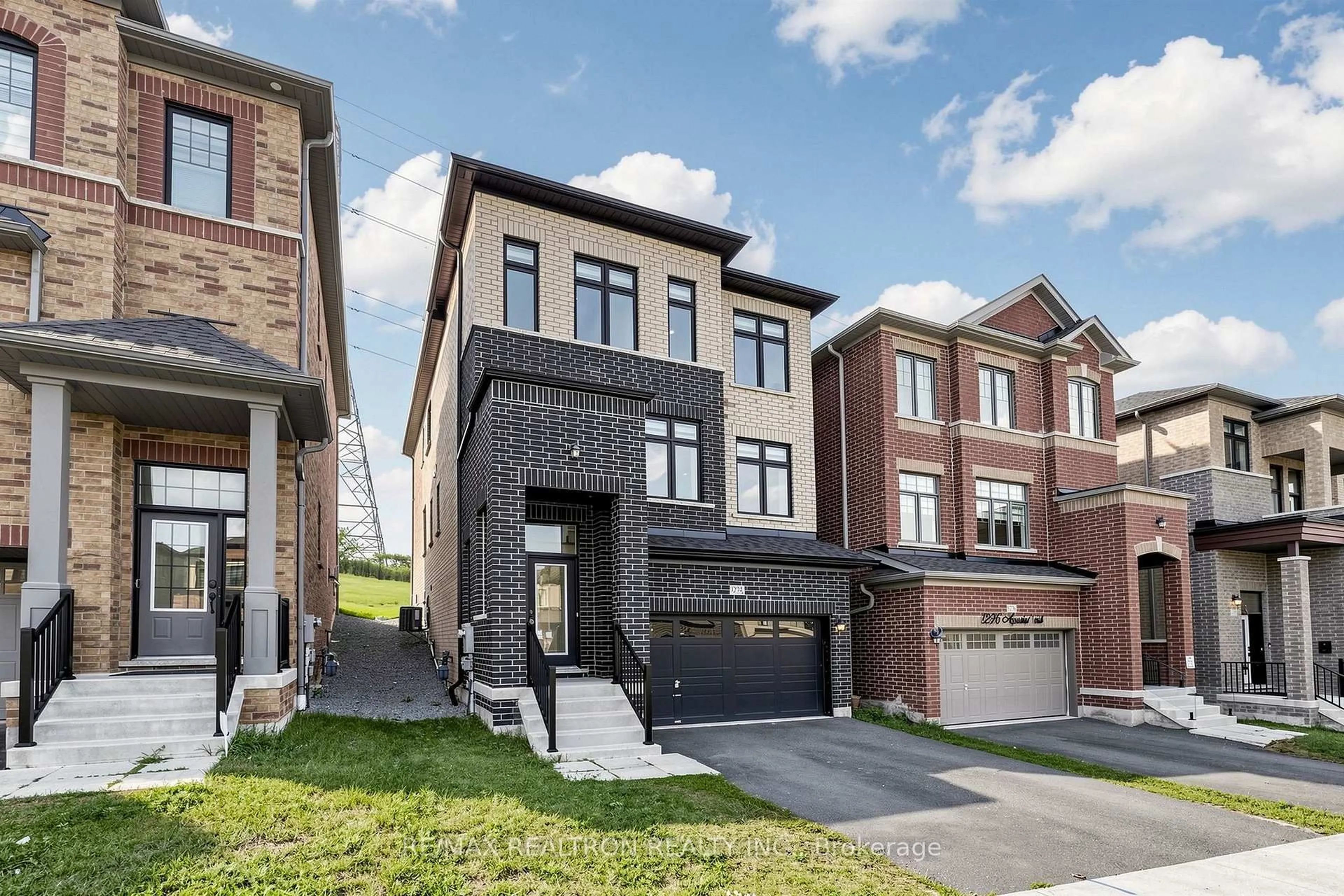 Home with brick exterior material, street for 1274 Aquarius Tr, Pickering Ontario L1X 0L9