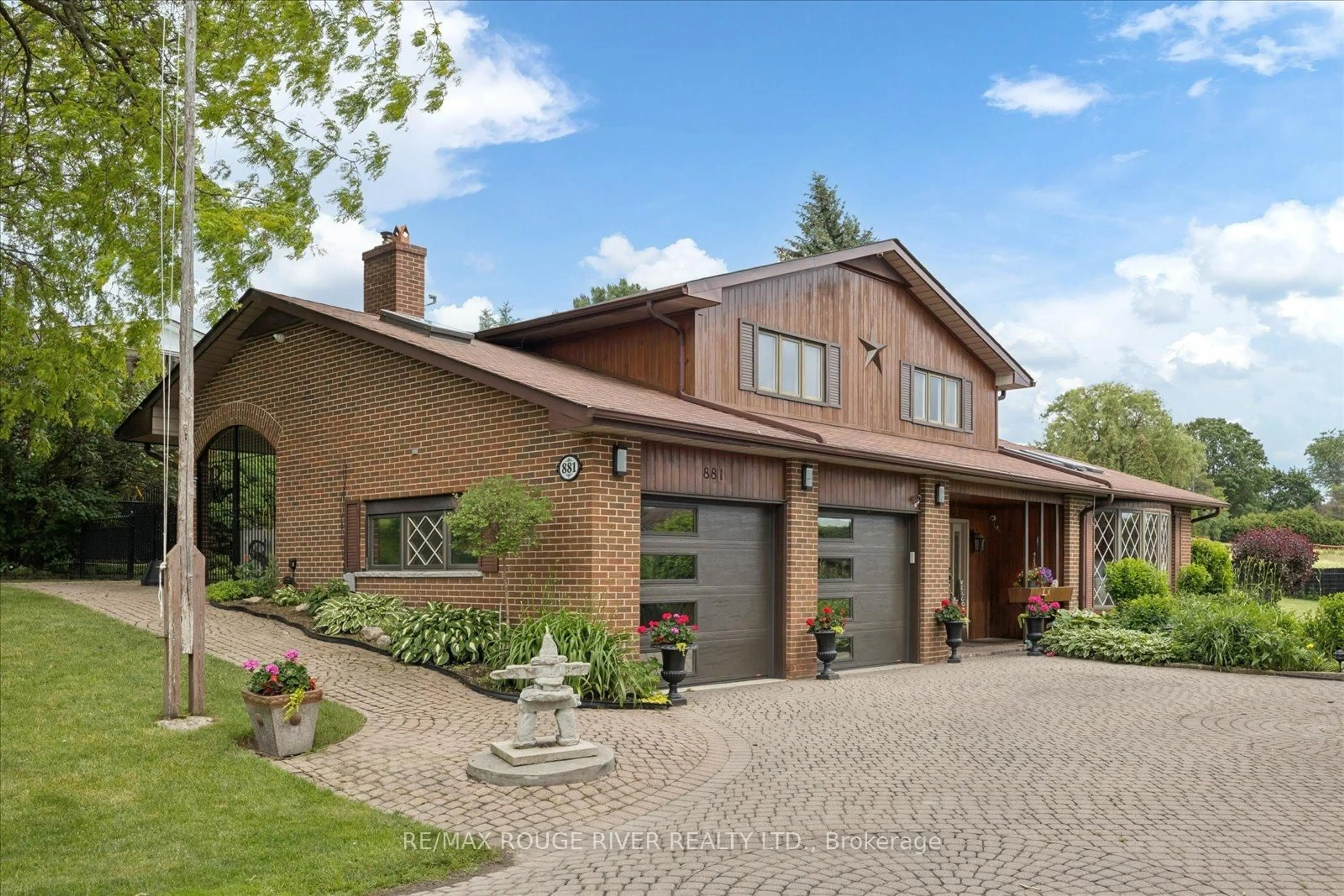 Home with brick exterior material, street for 881 Swiss Heights Dr, Oshawa Ontario L1K 2B1