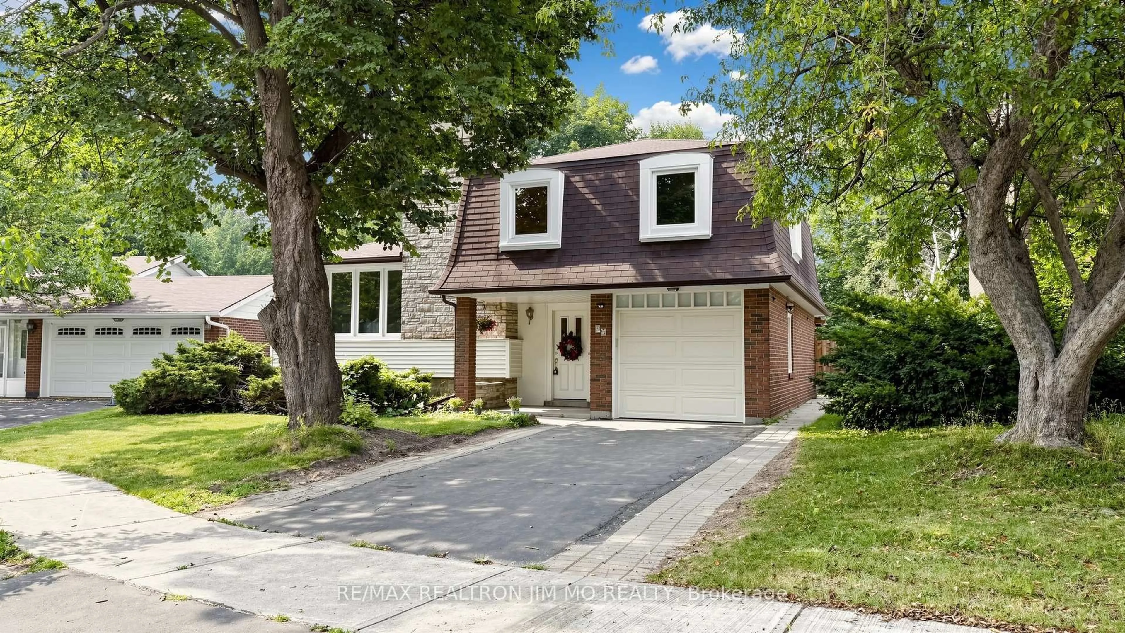 Home with brick exterior material, street for 40 Ravencliff Cres, Toronto Ontario M1T 1R8