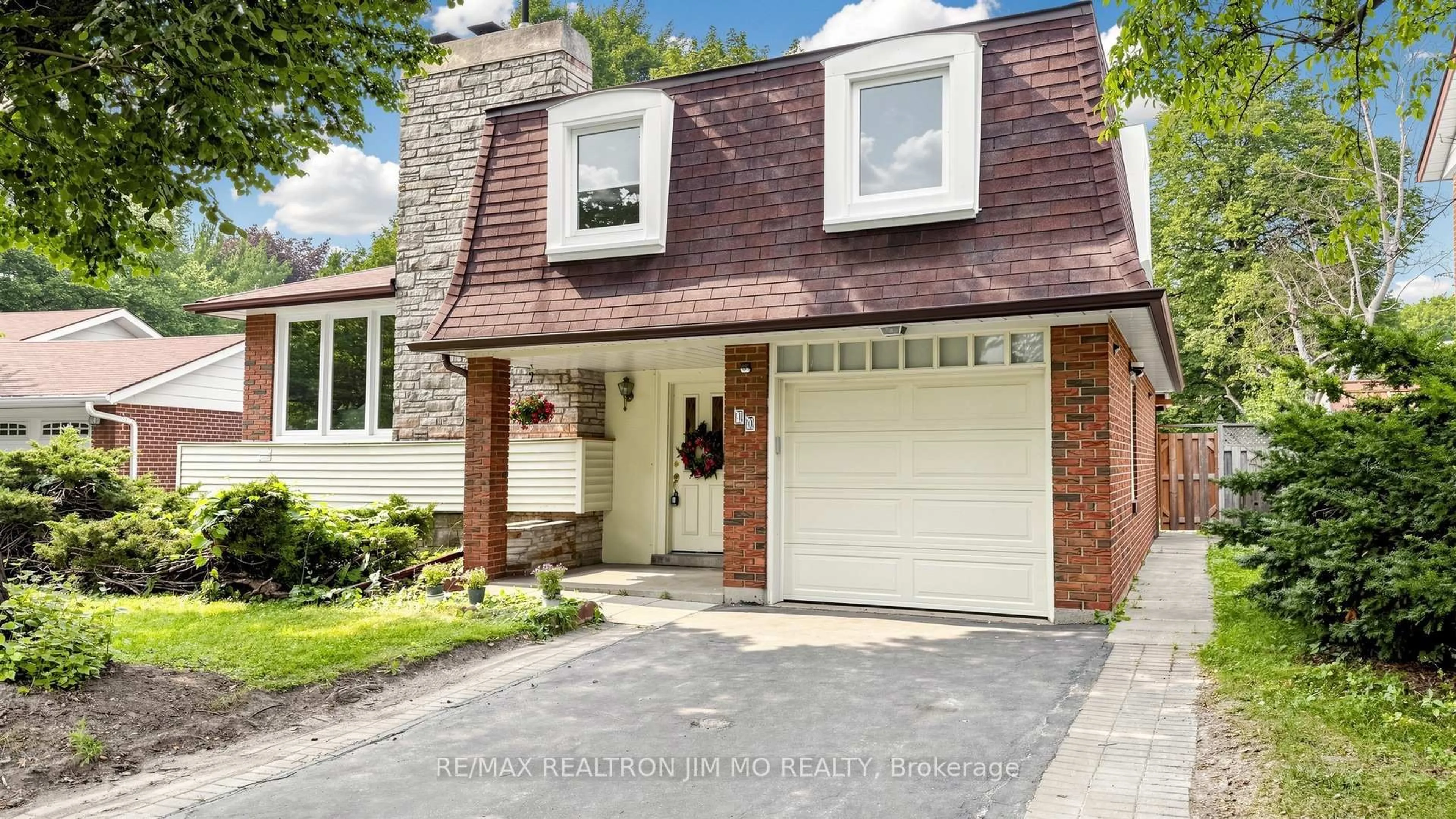 Home with brick exterior material, street for 40 Ravencliff Cres, Toronto Ontario M1T 1R8