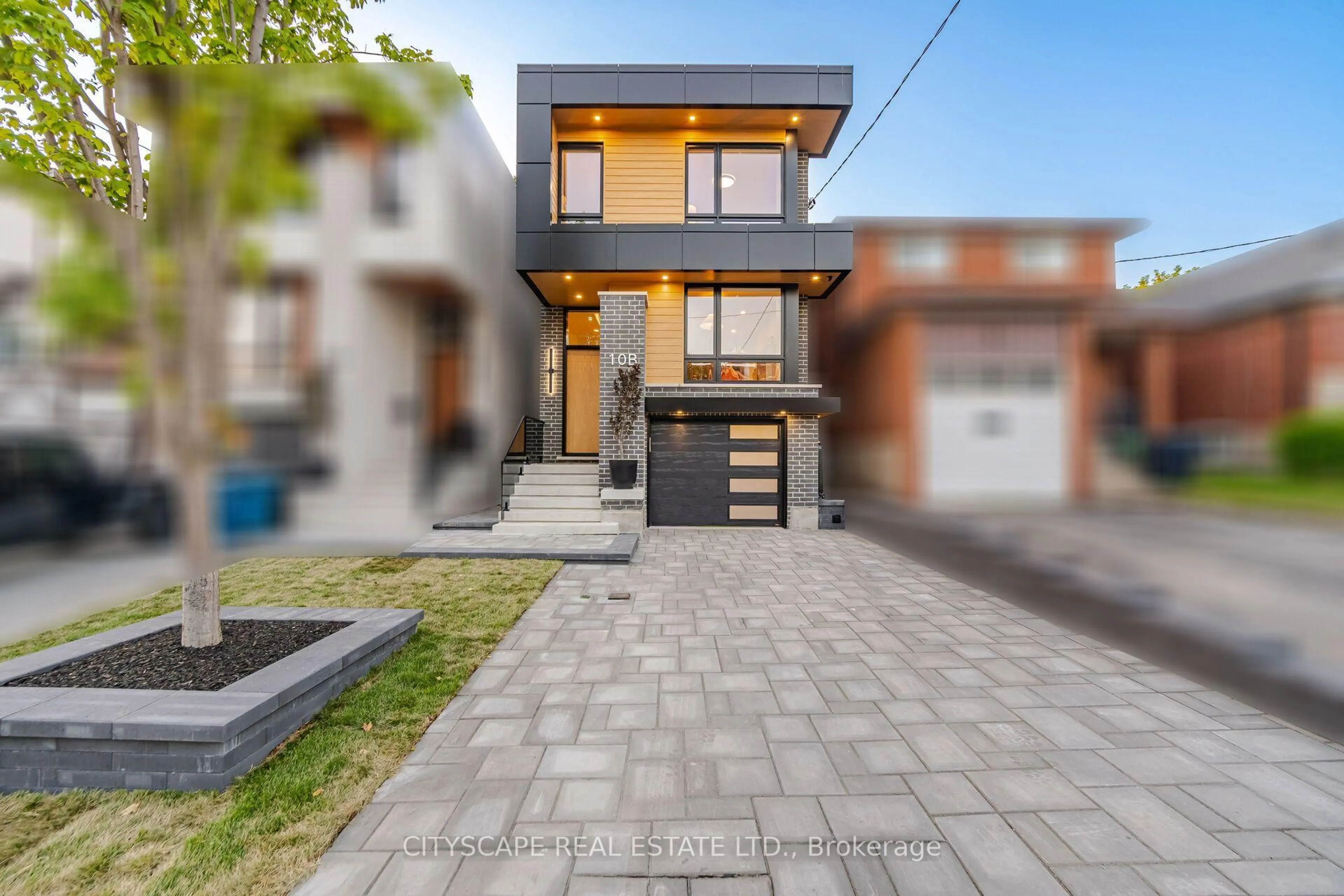 Home with brick exterior material, street for 10B Holmstead Ave, Toronto Ontario M4B 1T1