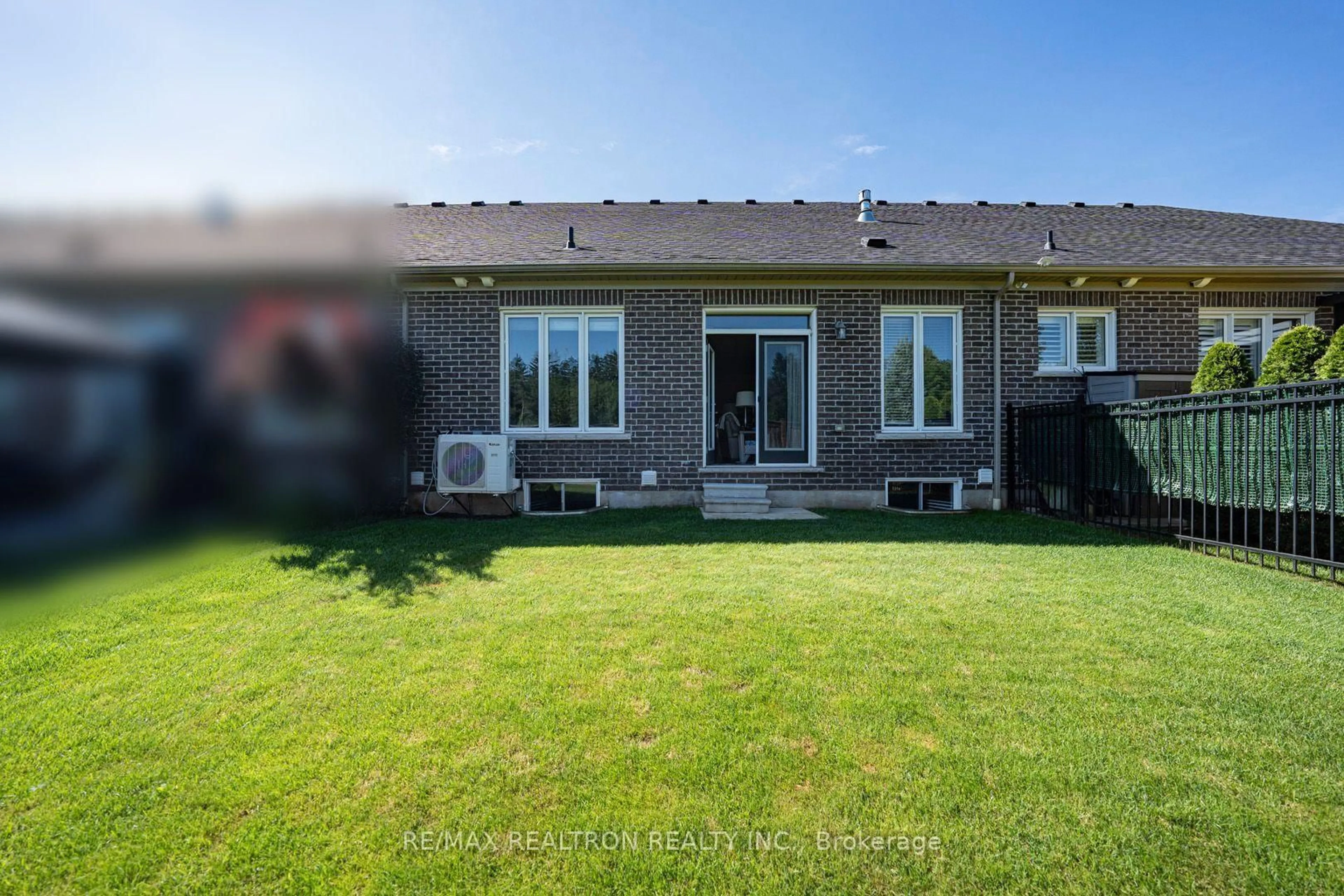 A pic from outside/outdoor area/front of a property/back of a property/a pic from drone, unknown for 33 Washburn Path, Clarington Ontario L1E 0J7