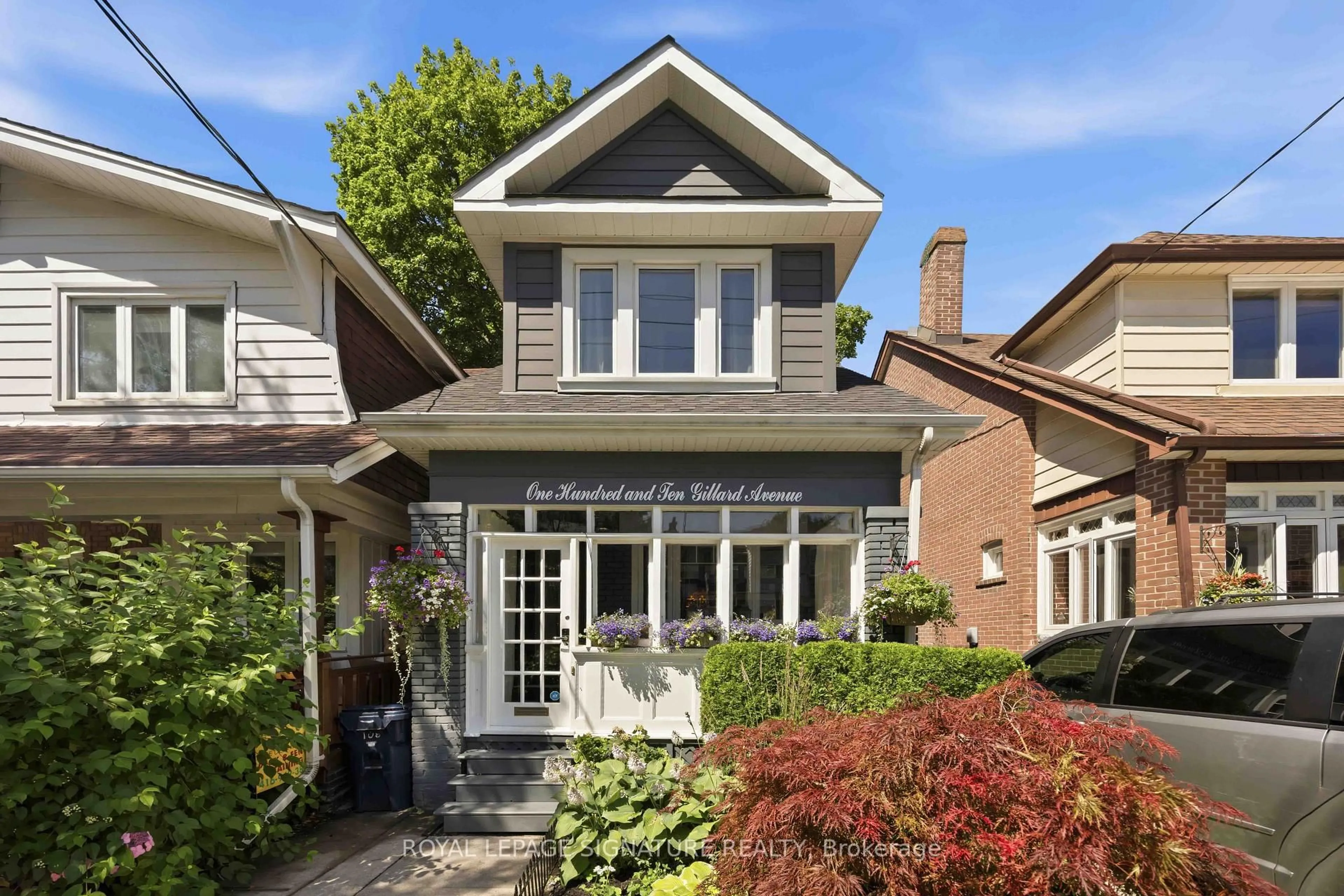 Home with brick exterior material, street for 110 Gillard Ave, Toronto Ontario M4J 4N6