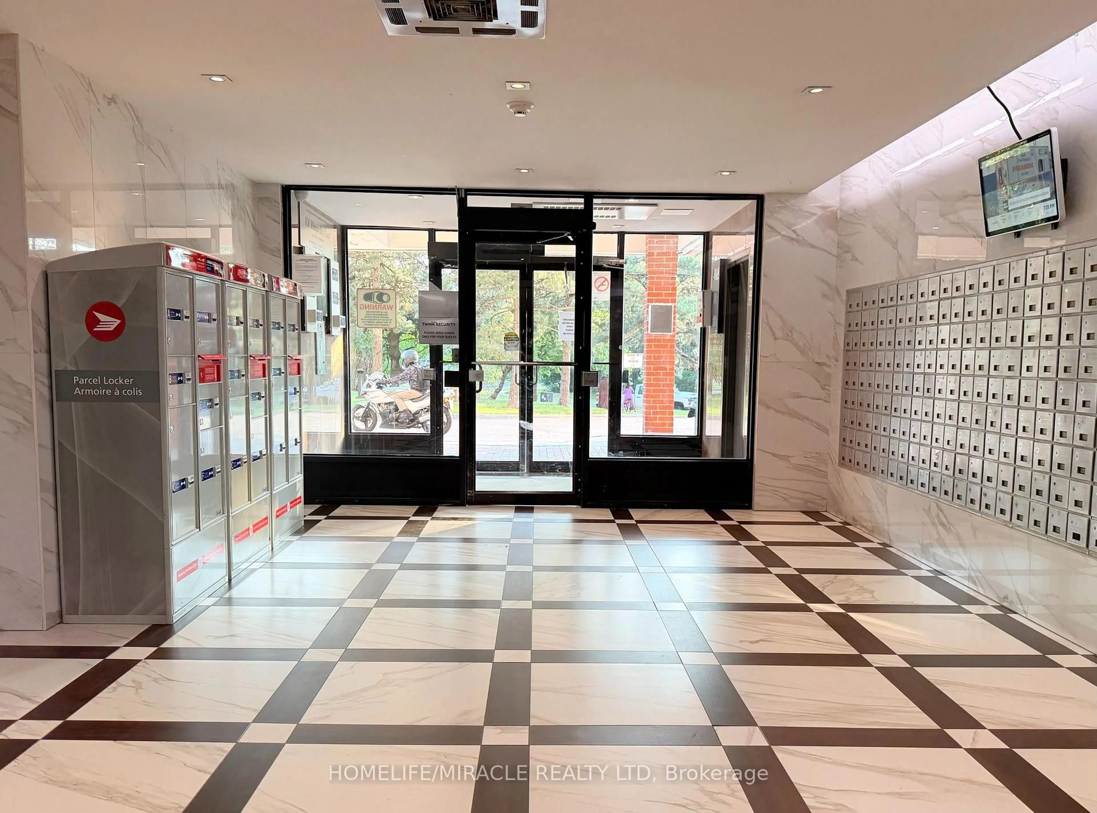 Indoor foyer for 100 Wingarden Crt #714, Toronto Ontario M1B 2P4