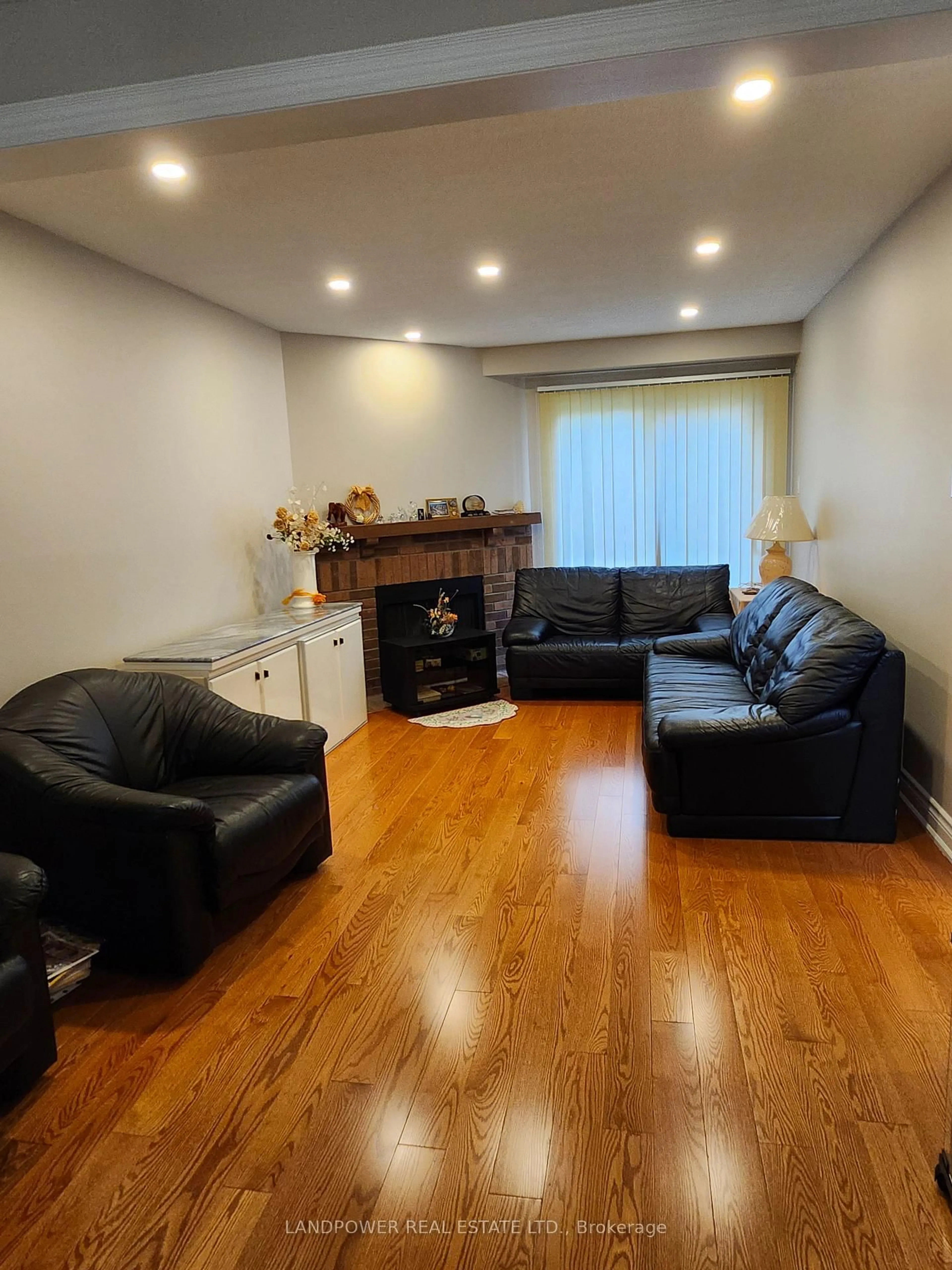 Living room with furniture, wood/laminate floor for 79 Coverdale Cres, Toronto Ontario M1V 2S6