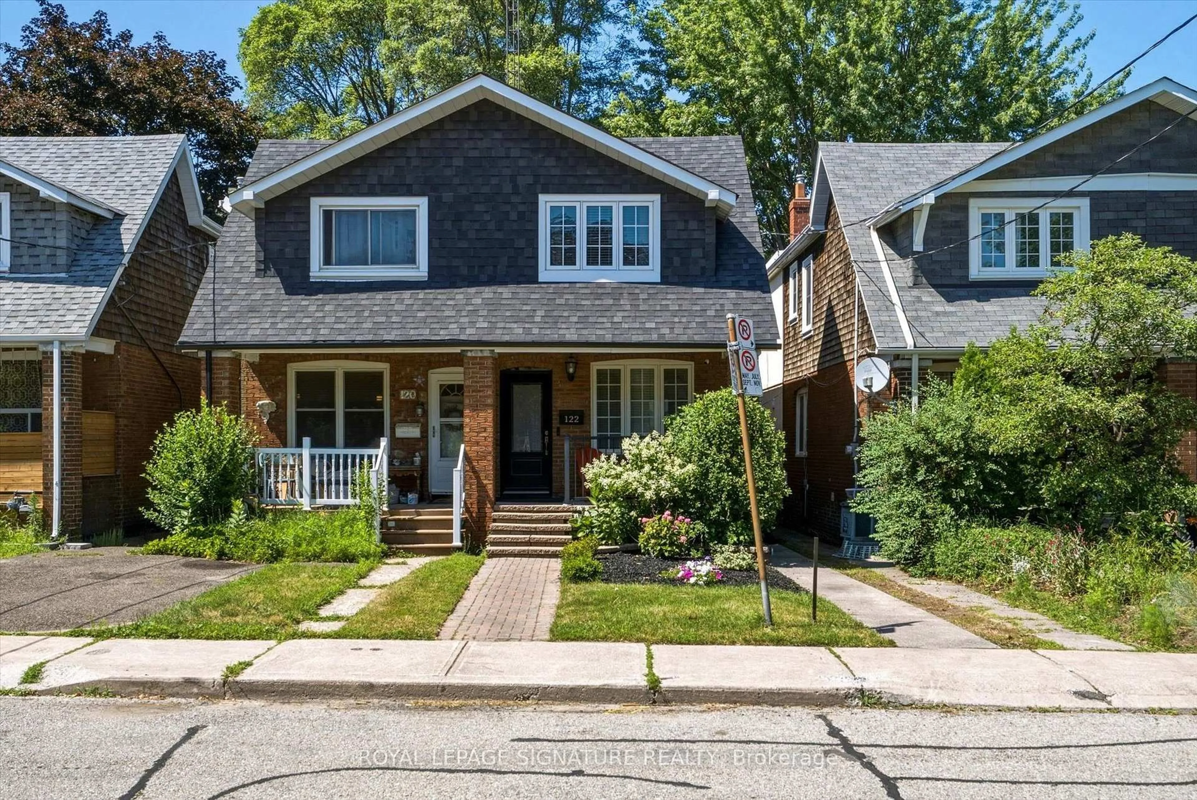 Home with brick exterior material, street for 122 Holborne Ave, Toronto Ontario M4C 2R4