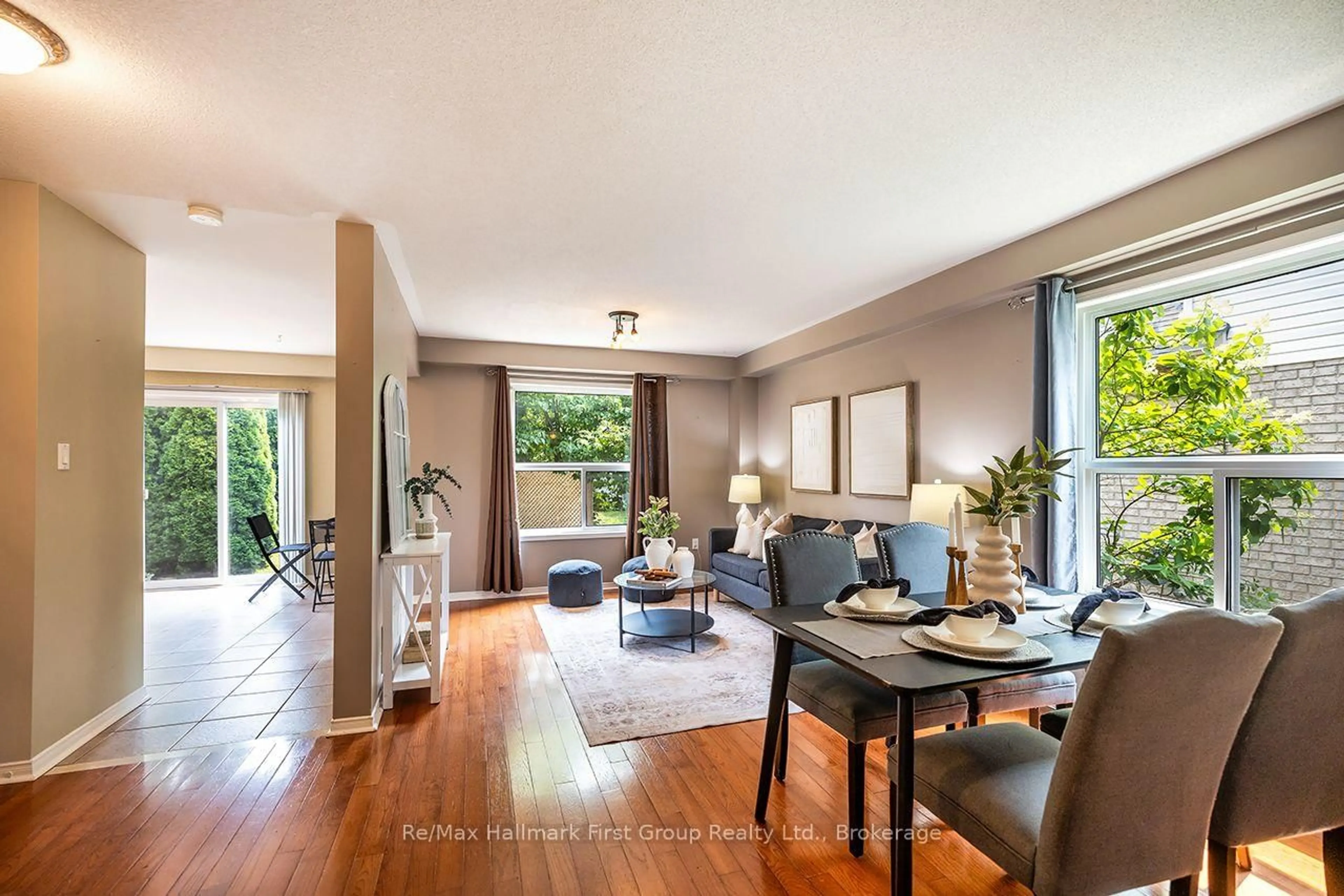 Living room with furniture, wood/laminate floor for 10 Winchurch Dr, Scugog Ontario L9L 1T6