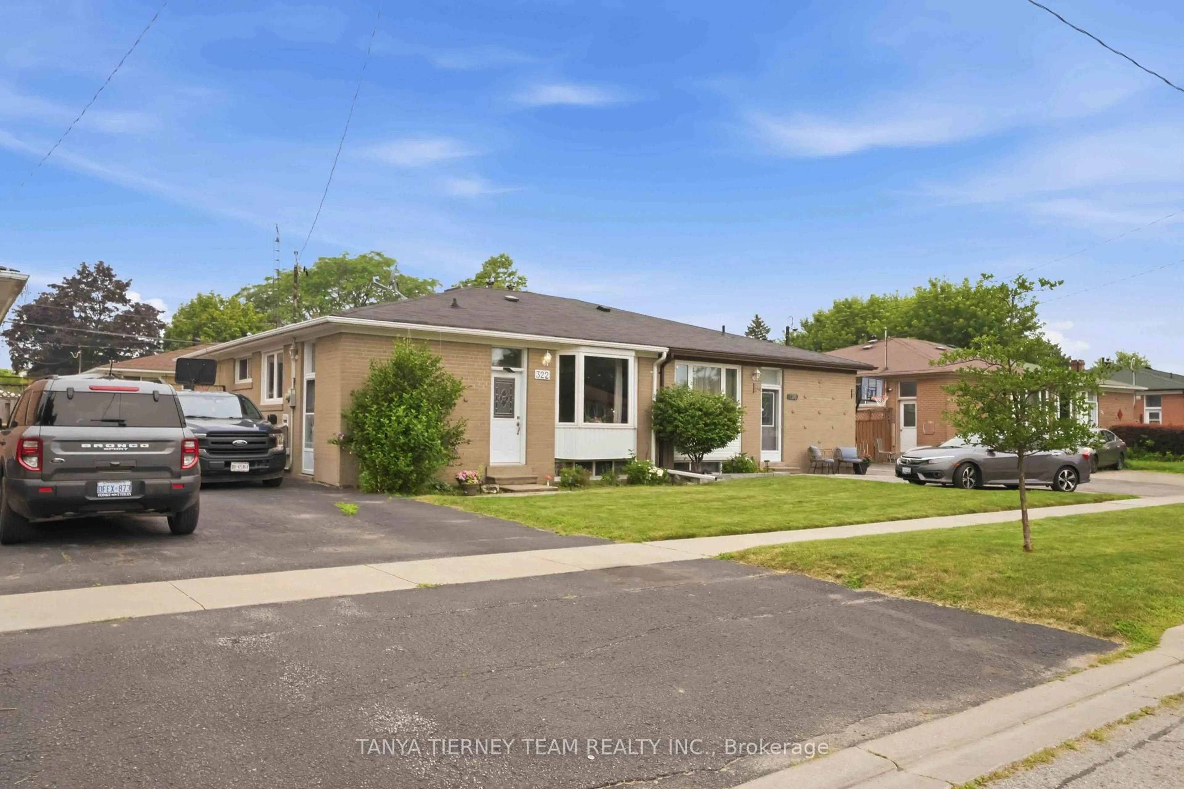 Home with brick exterior material, street for 322 Rosedale Dr, Whitby Ontario L1N 1Z3