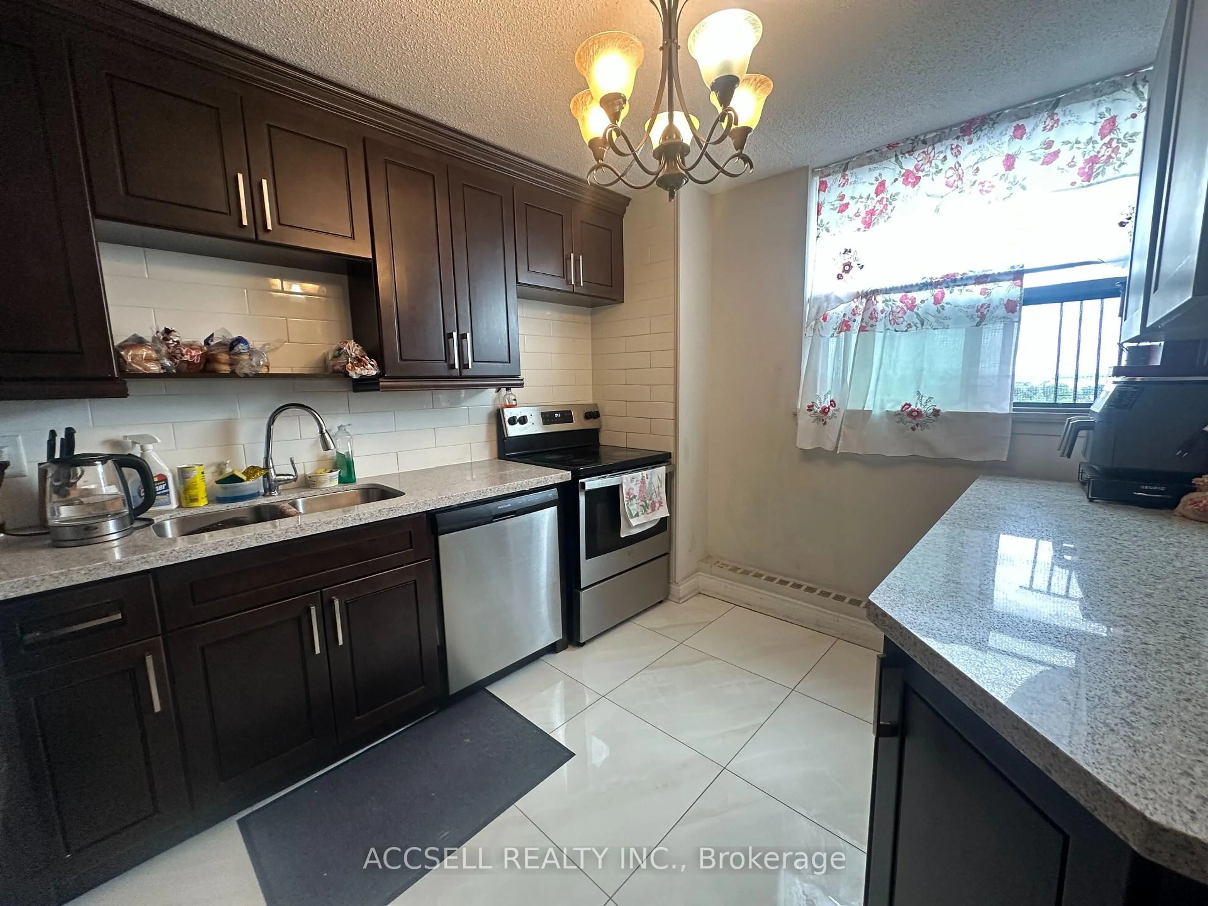 Standard kitchen, ceramic/tile floor for 100 Wingarden Crt #1109, Toronto Ontario M1B 2P4