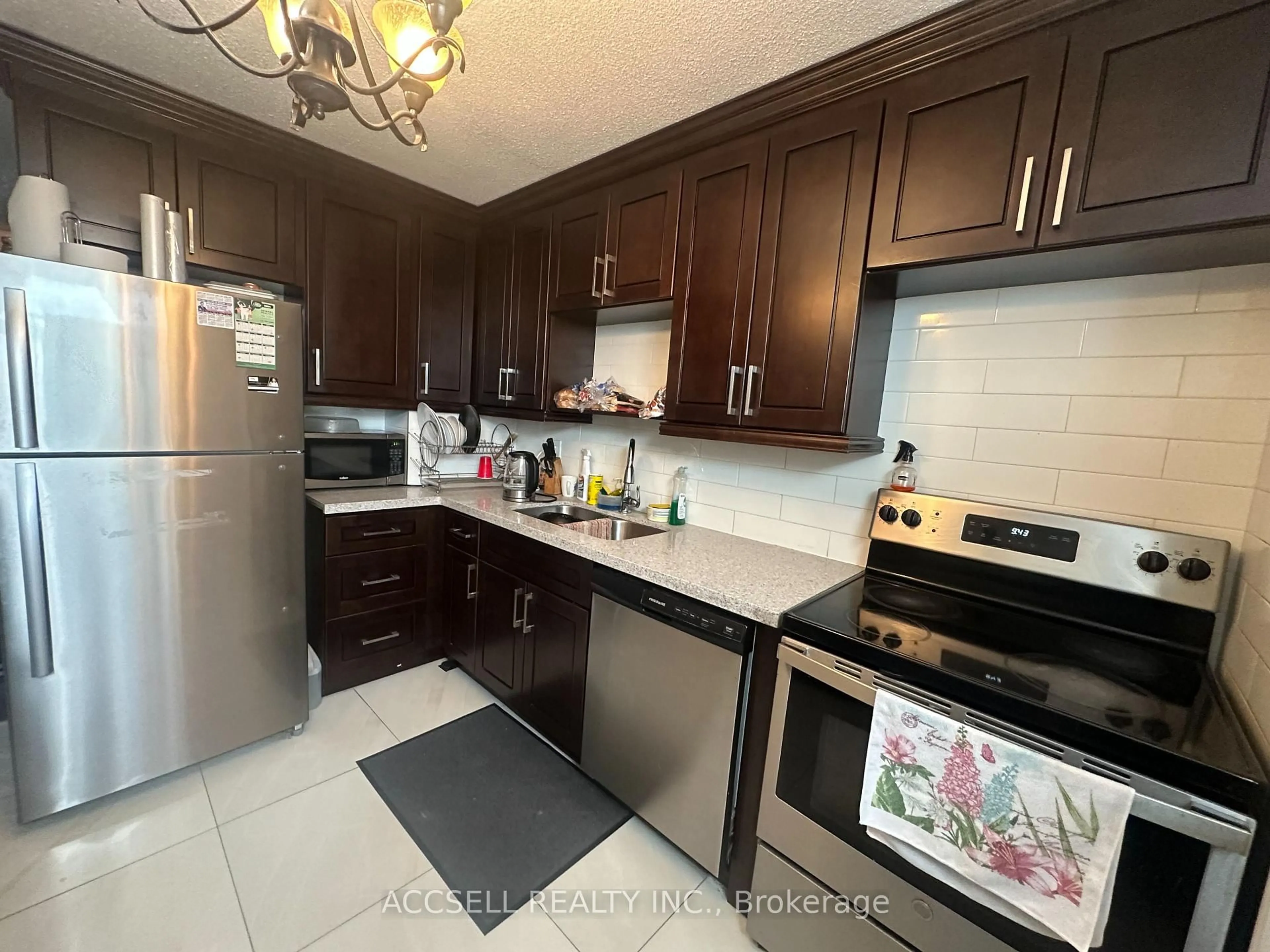 Standard kitchen, ceramic/tile floor for 100 Wingarden Crt #1109, Toronto Ontario M1B 2P4