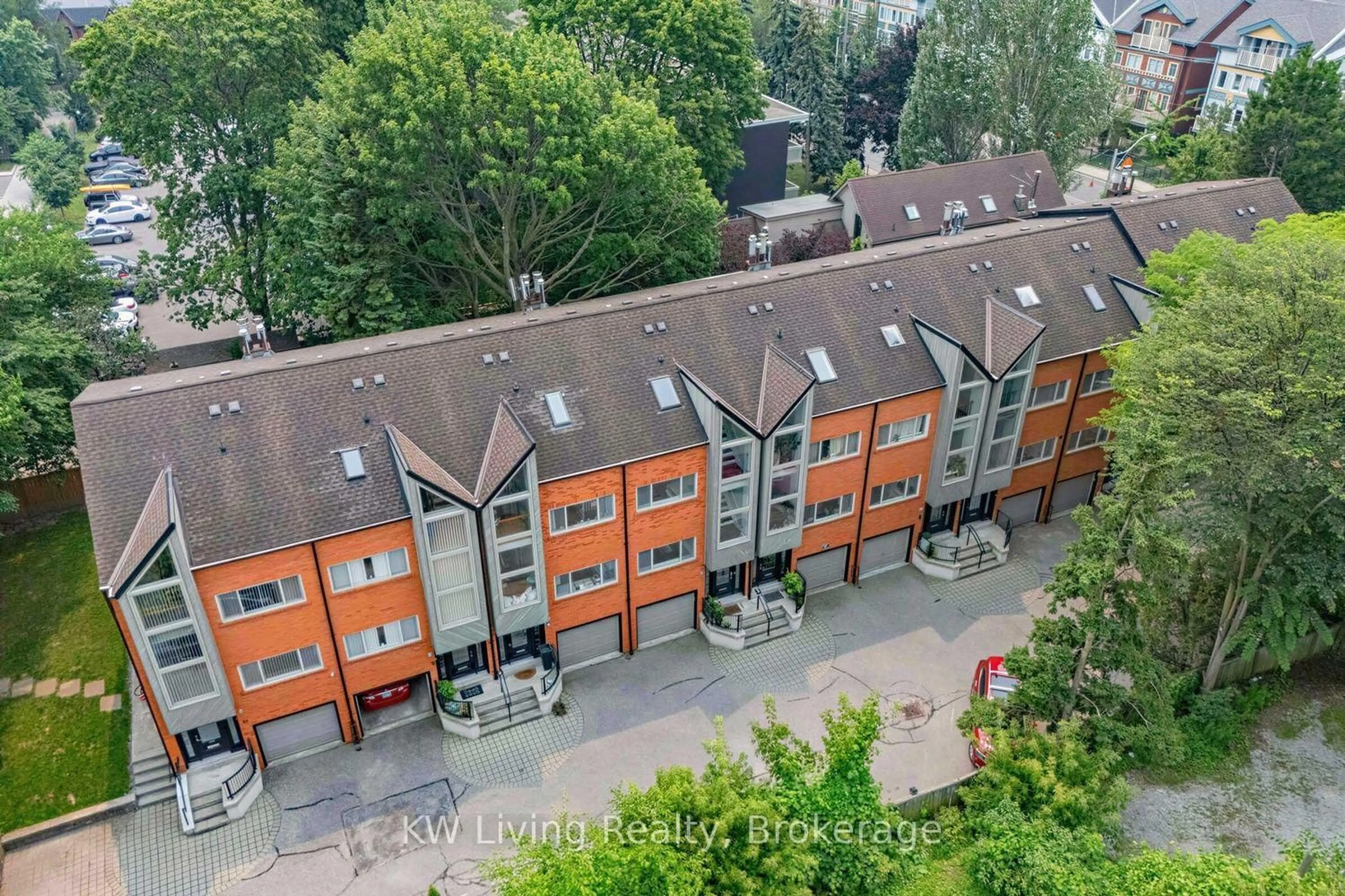 A pic from outside/outdoor area/front of a property/back of a property/a pic from drone, city buildings view from balcony for 155 Woodbine Ave #TH7, Toronto Ontario M4L 3P1