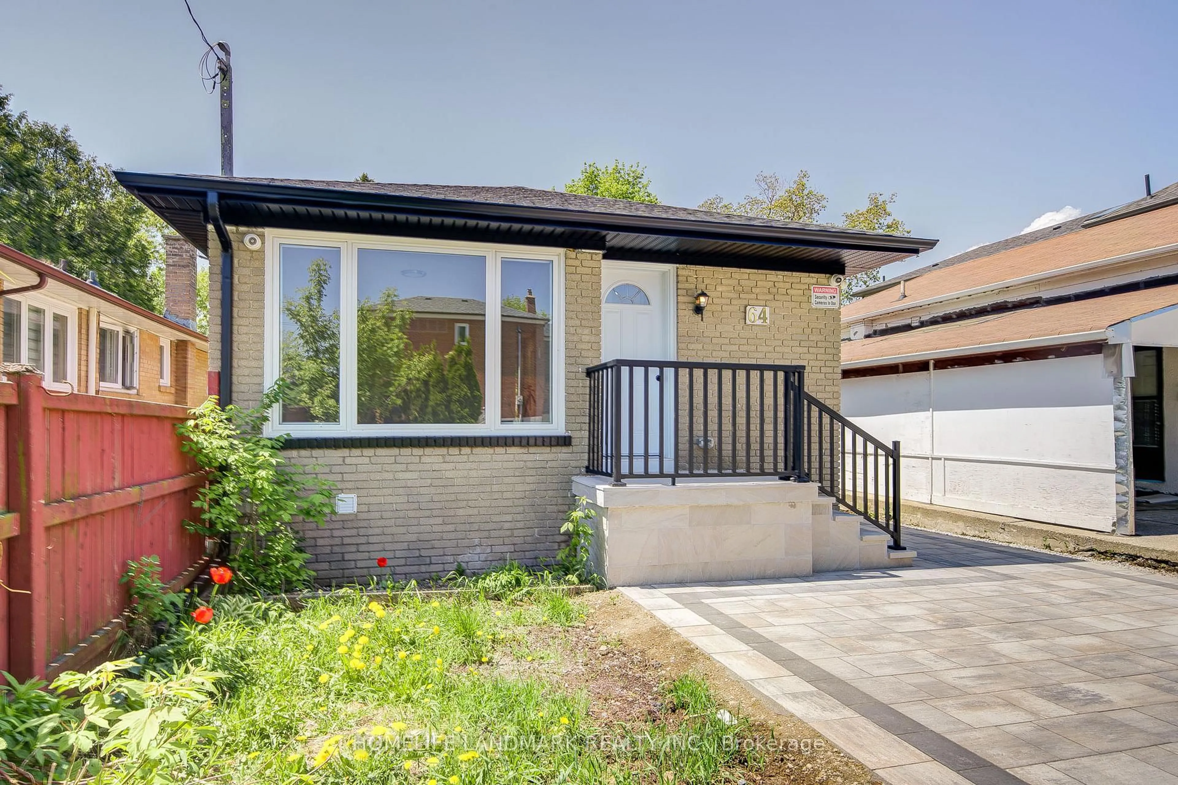 Home with brick exterior material, street for 64 Laurel Ave, Toronto Ontario M1K 3J6