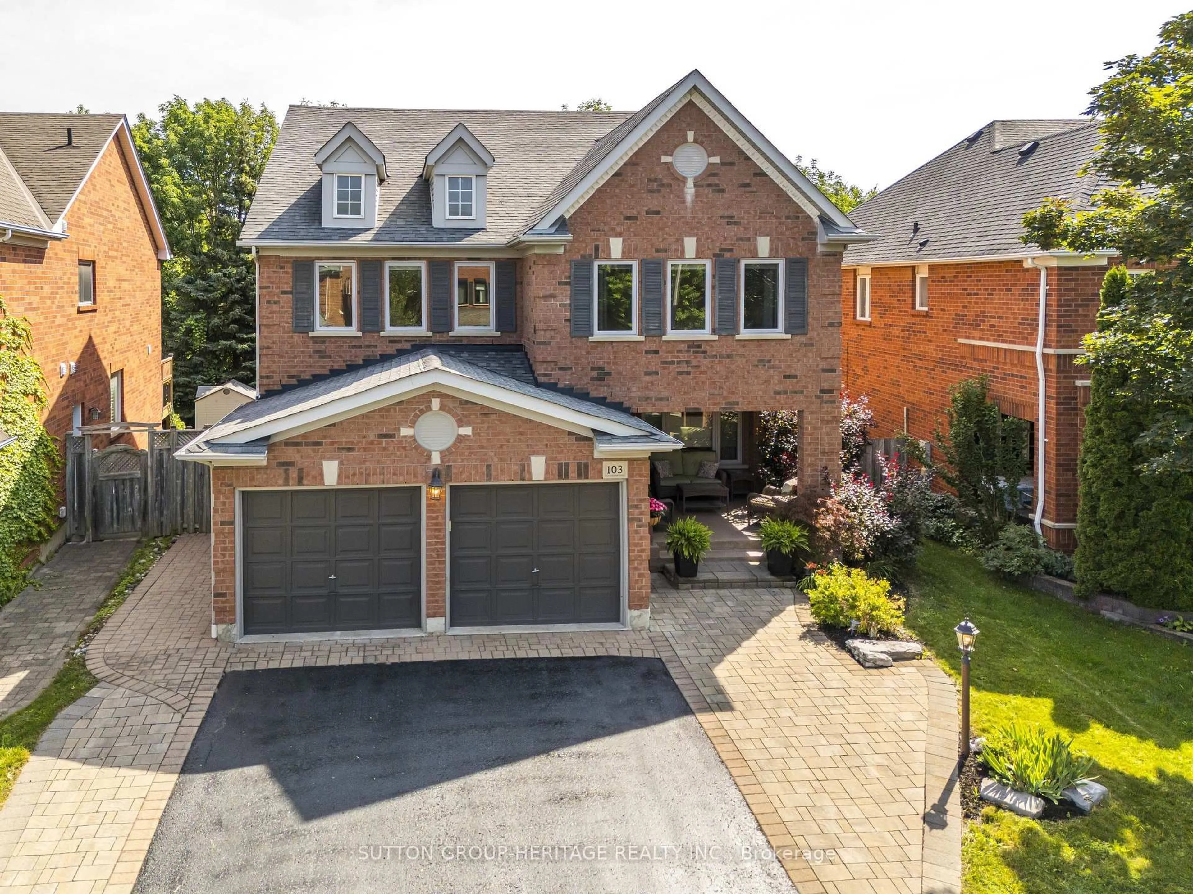 Home with brick exterior material, street for 103 Gartshore Dr, Whitby Ontario L1P 1N8
