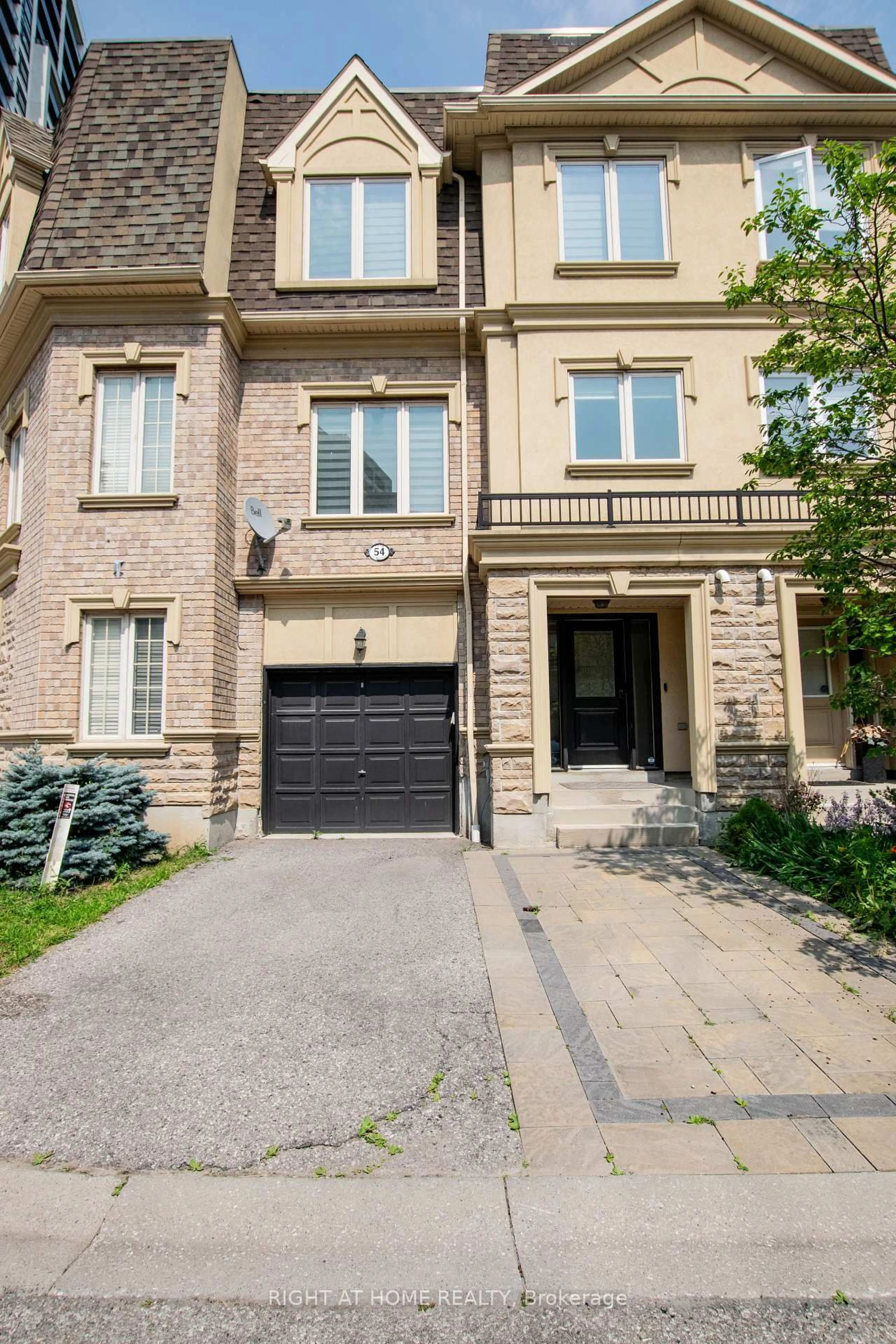 Home with brick exterior material, street for 1250 St Martins Dr #54, Pickering Ontario L1W 1L7