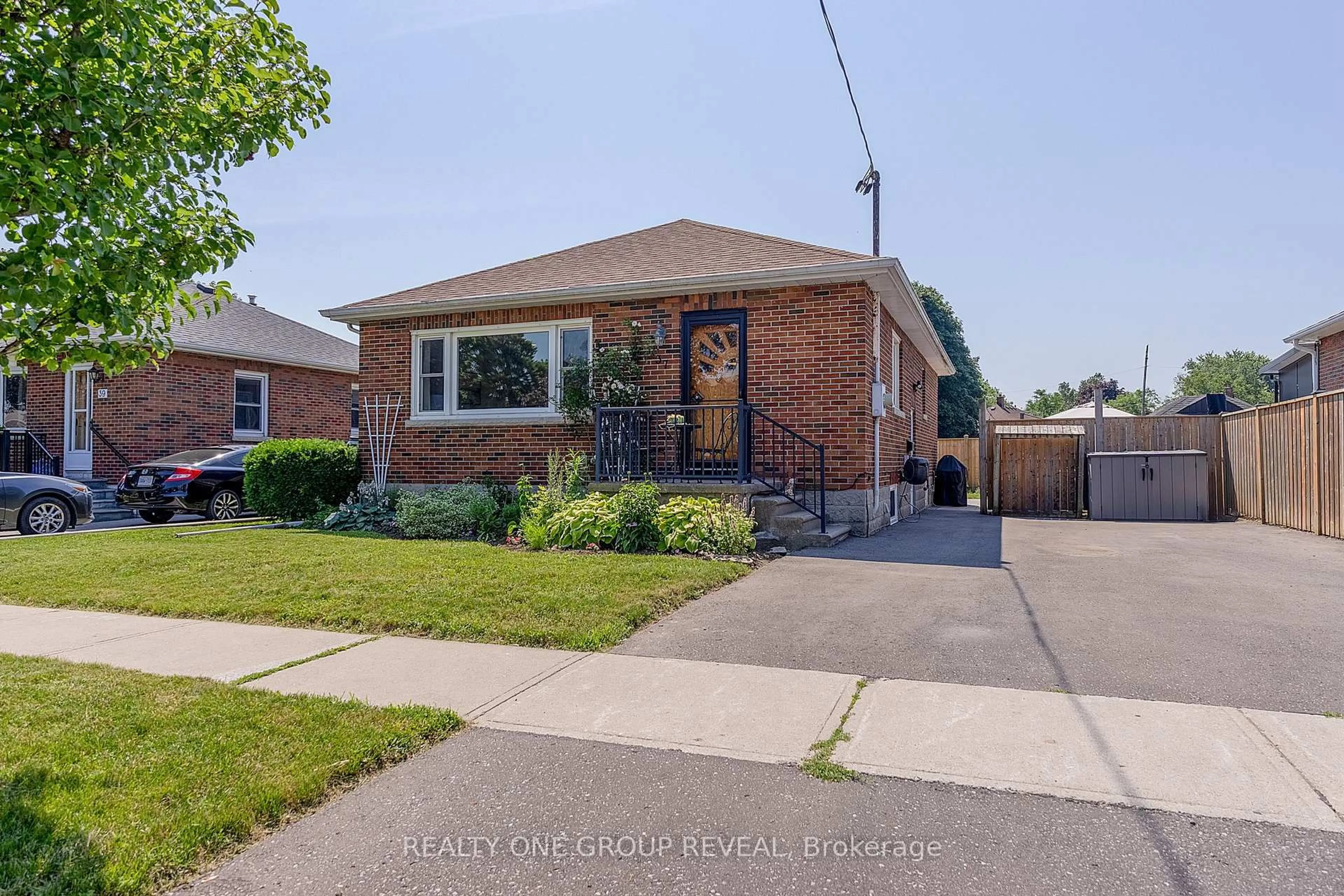 Home with brick exterior material, street for 37 Prince St, Clarington Ontario L1C 1G4