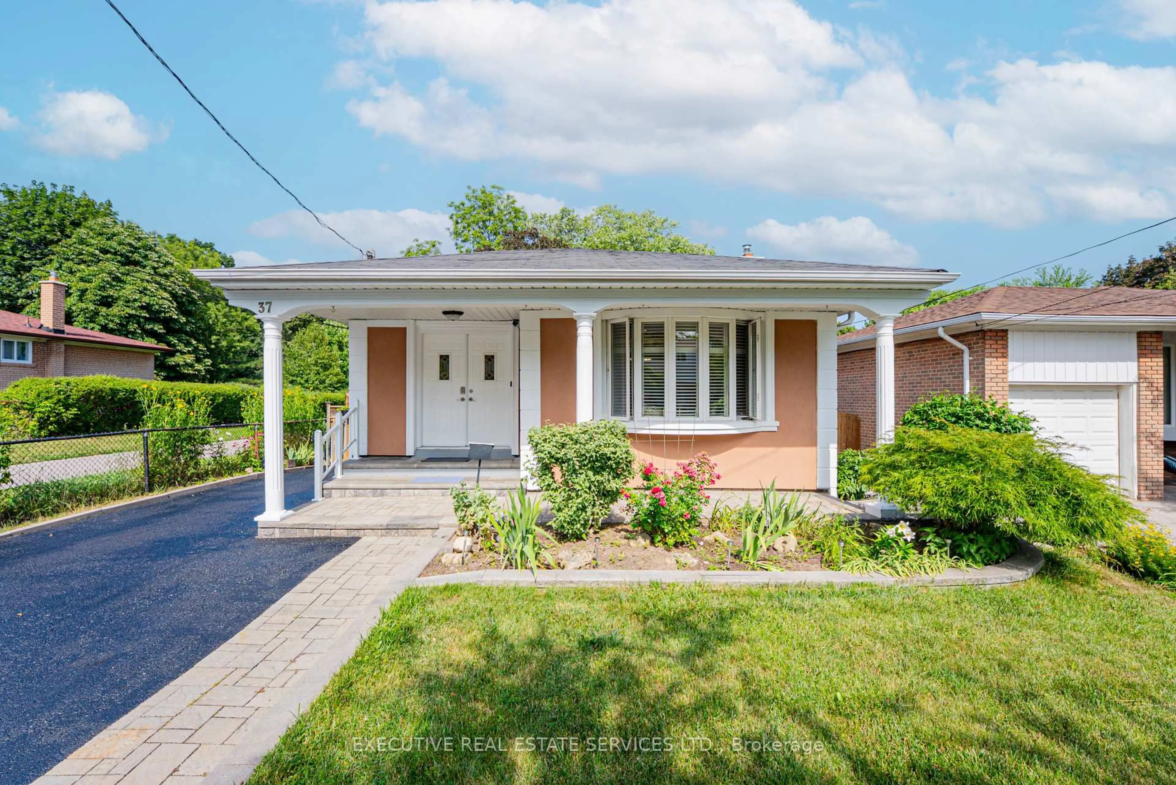 Home with brick exterior material, street for 37 Ravenview Dr, Toronto Ontario M1E 3L9