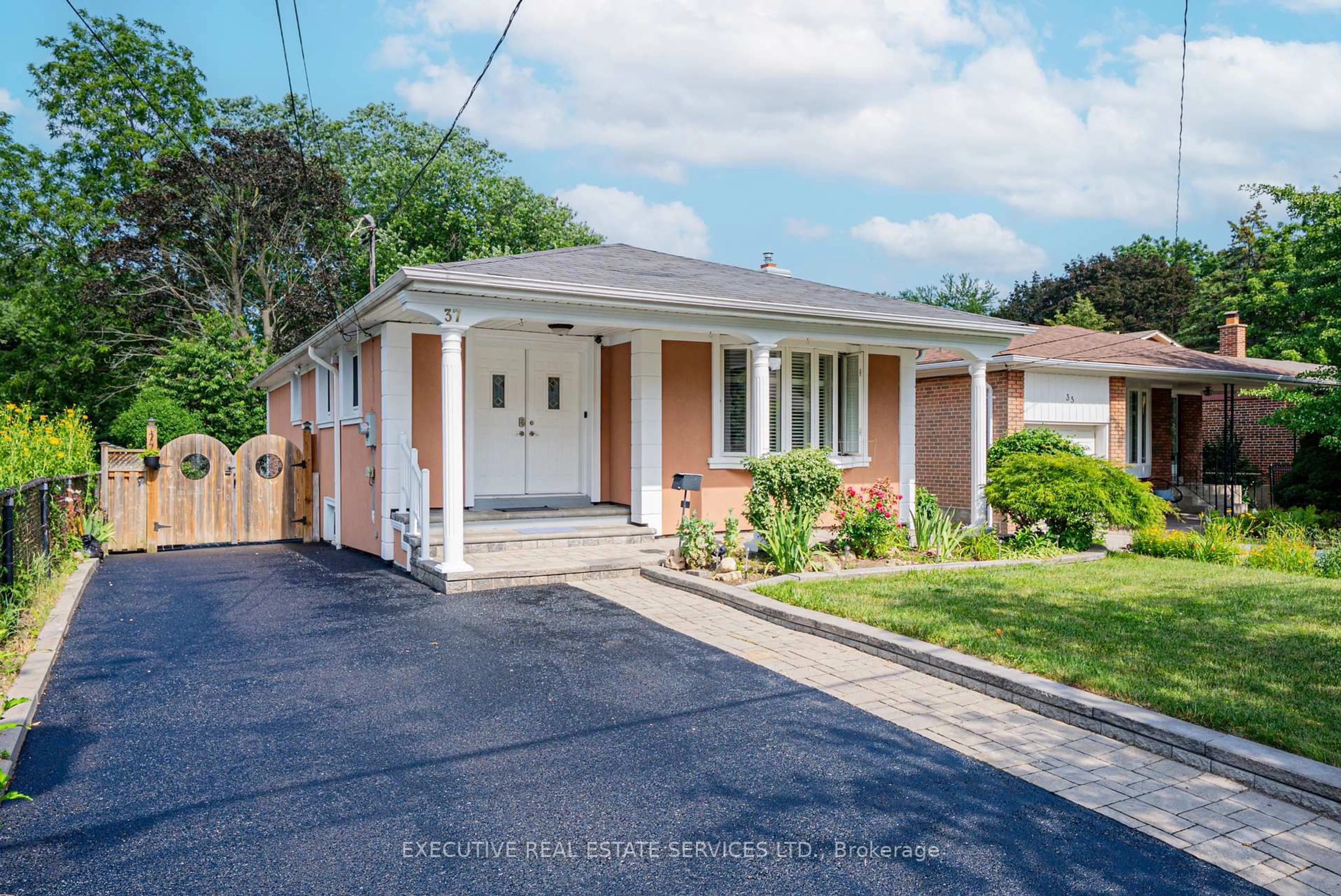 Home with brick exterior material, street for 37 Ravenview Dr, Toronto Ontario M1E 3L9