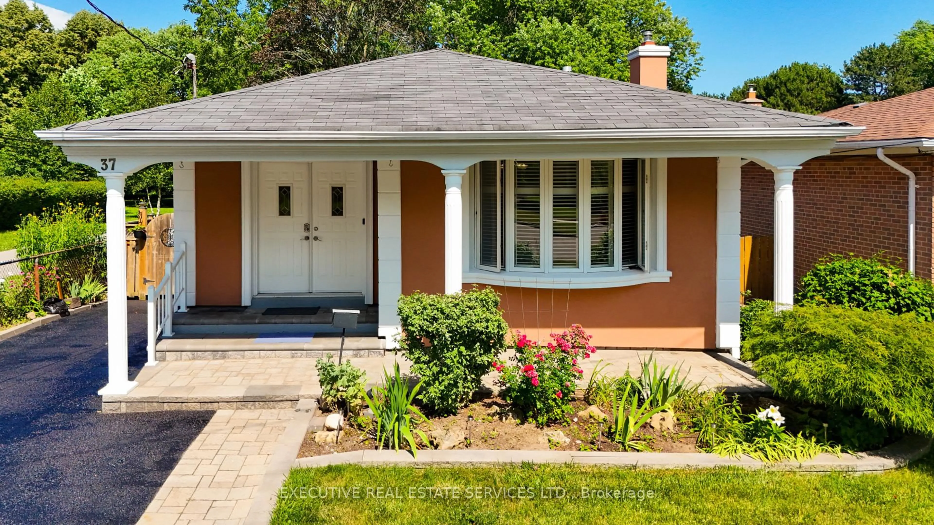 Home with brick exterior material, street for 37 Ravenview Dr, Toronto Ontario M1E 3L9