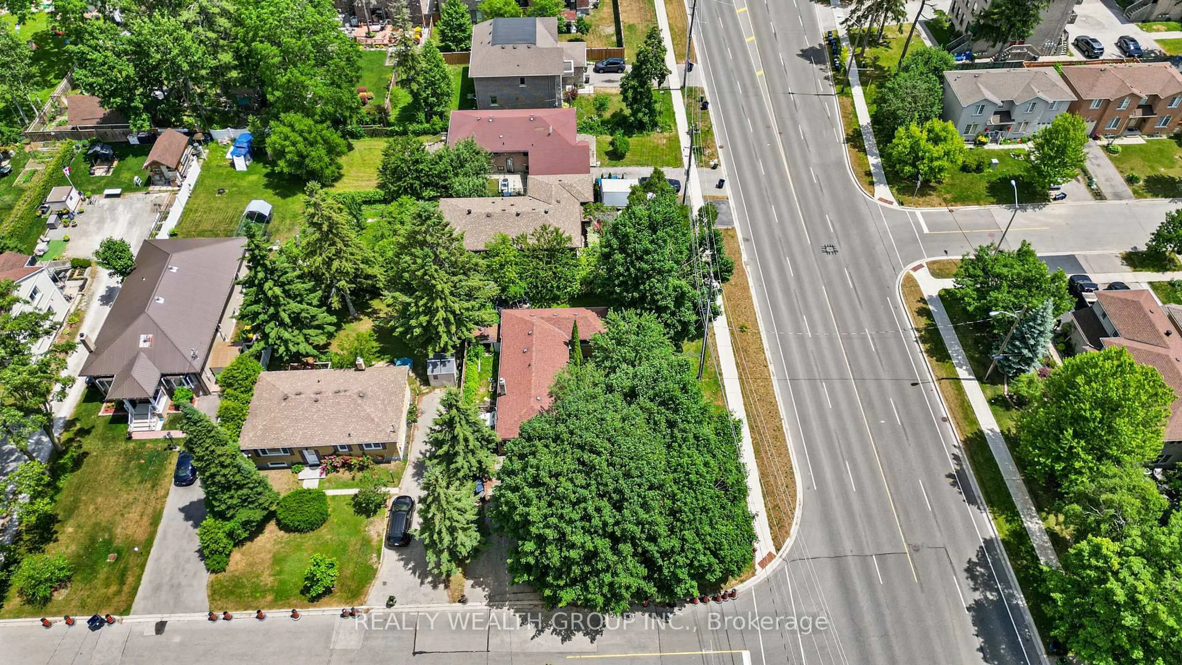 A pic from outside/outdoor area/front of a property/back of a property/a pic from drone, street for 4450 Lawrence Ave, Toronto Ontario M1E 2T9