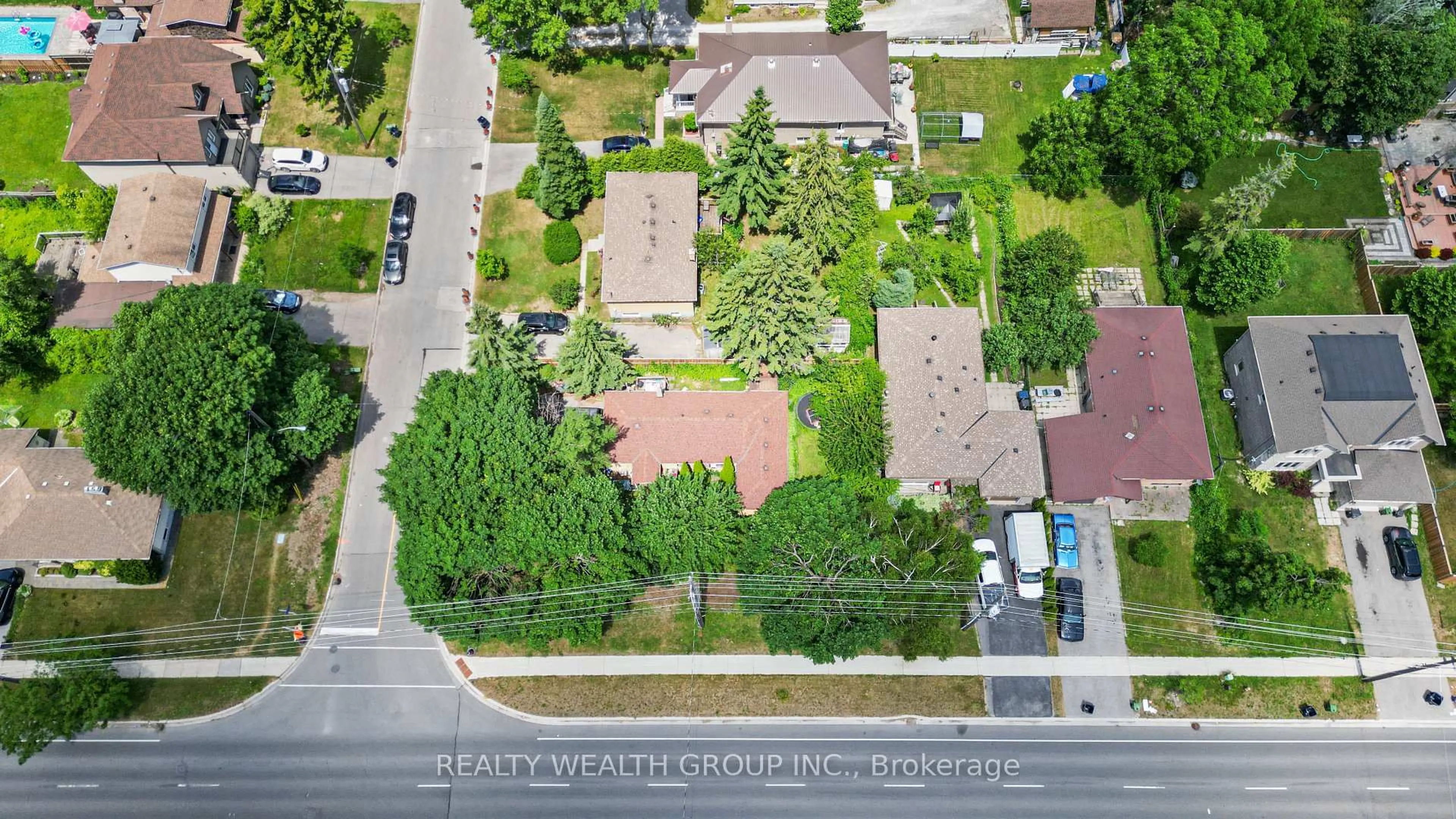A pic from outside/outdoor area/front of a property/back of a property/a pic from drone, street for 4450 Lawrence Ave, Toronto Ontario M1E 2T9