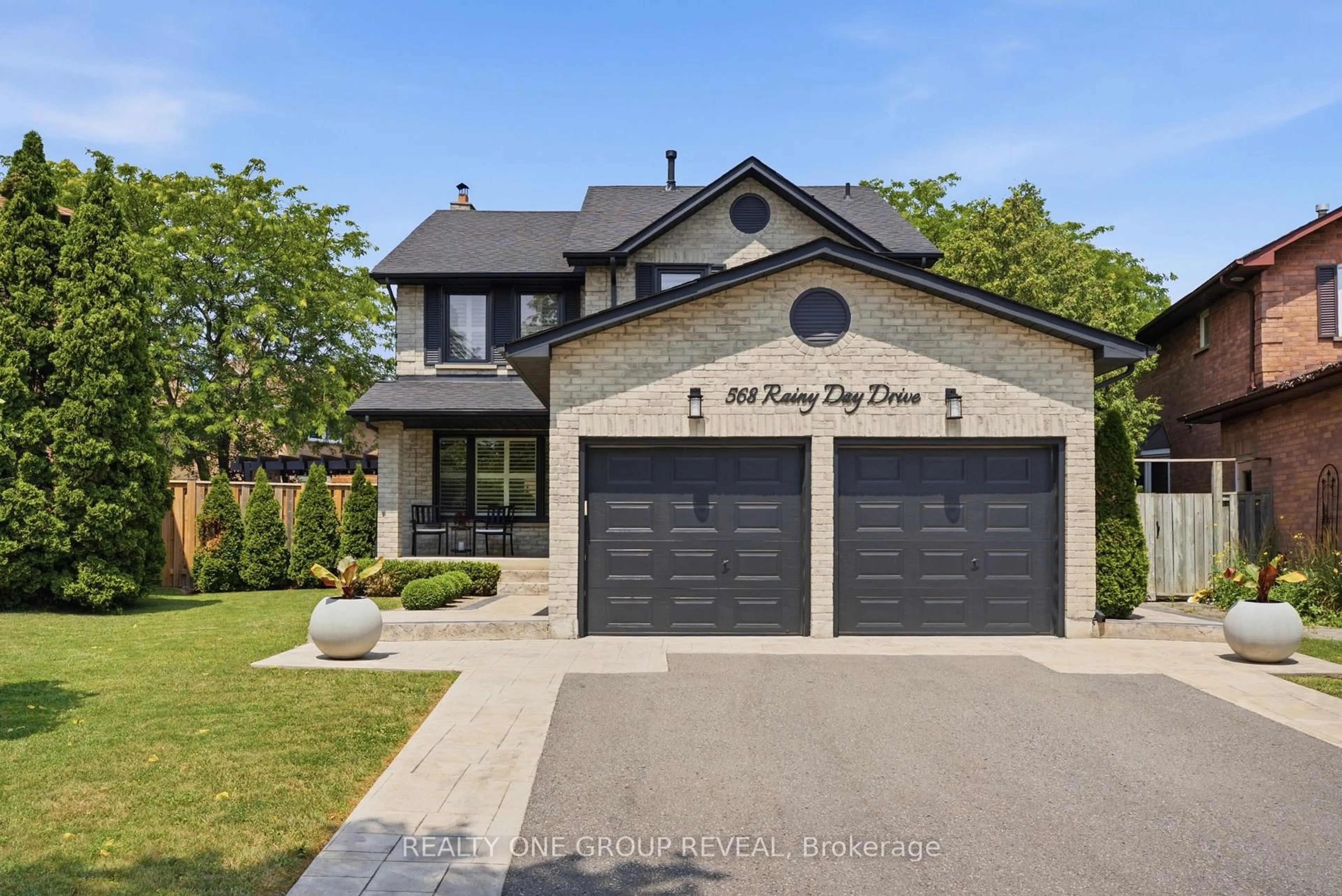 Home with brick exterior material, street for 568 Rainy Day Dr, Pickering Ontario L1V 5Z2