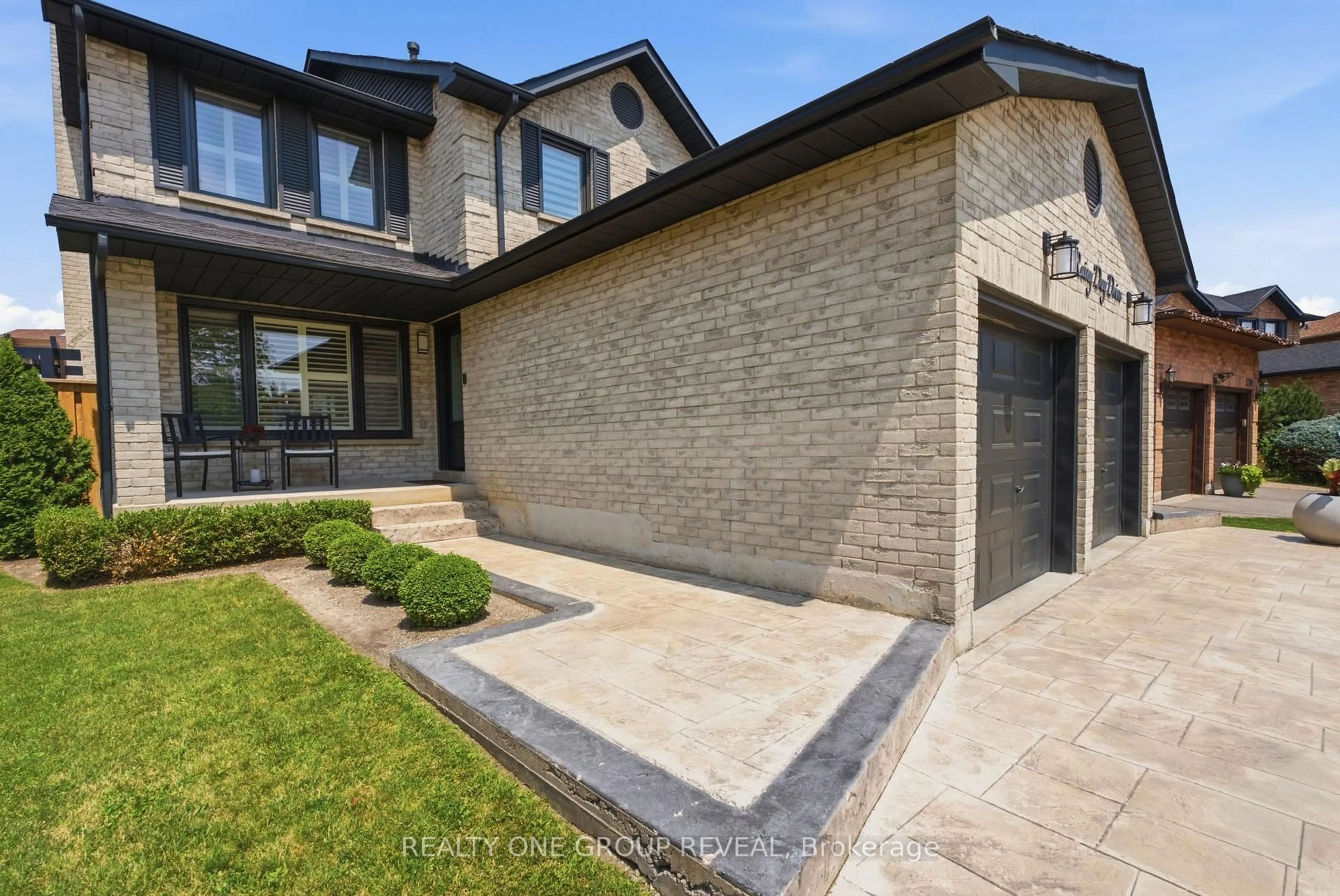 Home with brick exterior material, street for 568 Rainy Day Dr, Pickering Ontario L1V 5Z2