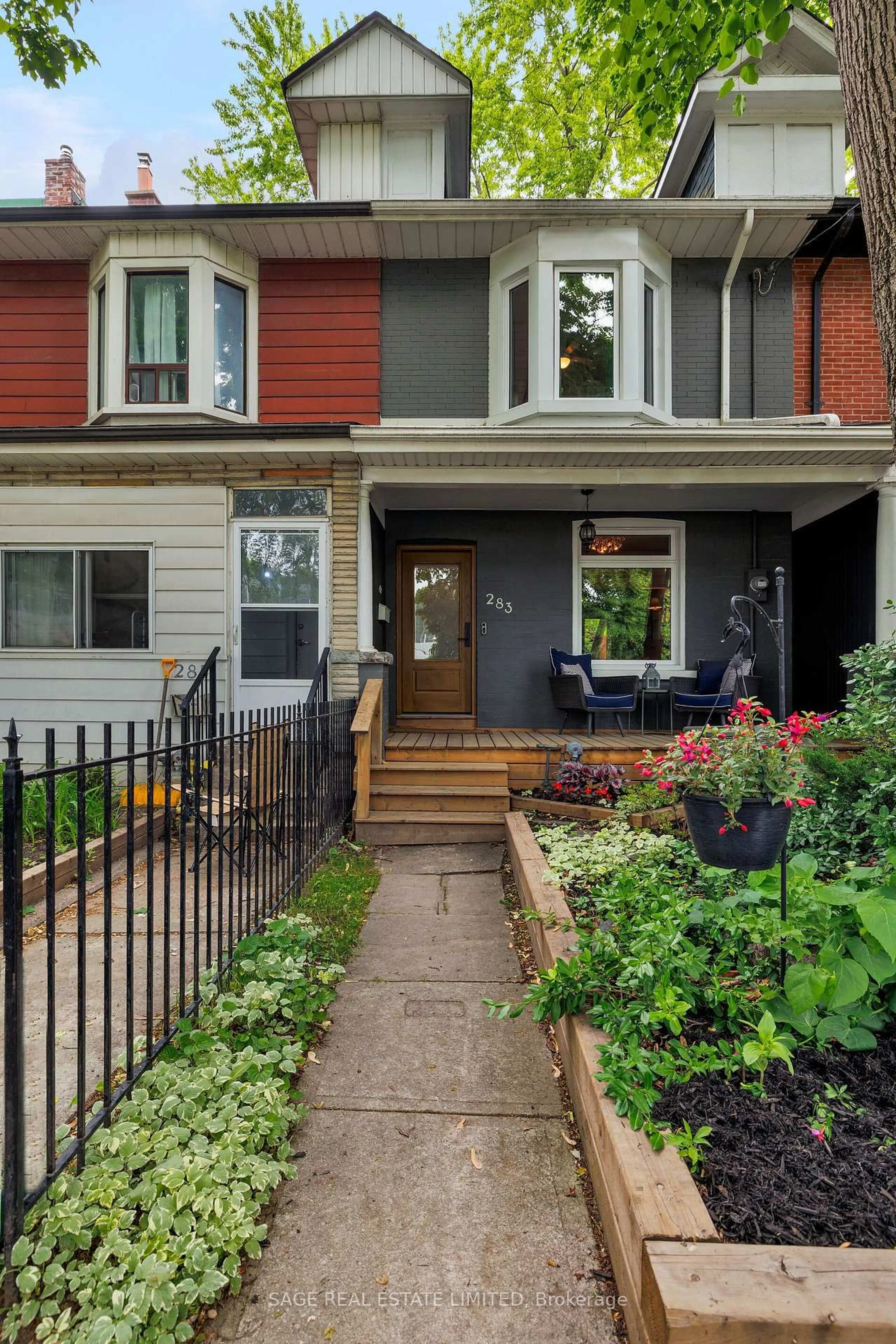 Home with brick exterior material, street for 283 Booth Ave, Toronto Ontario M4M 2M7