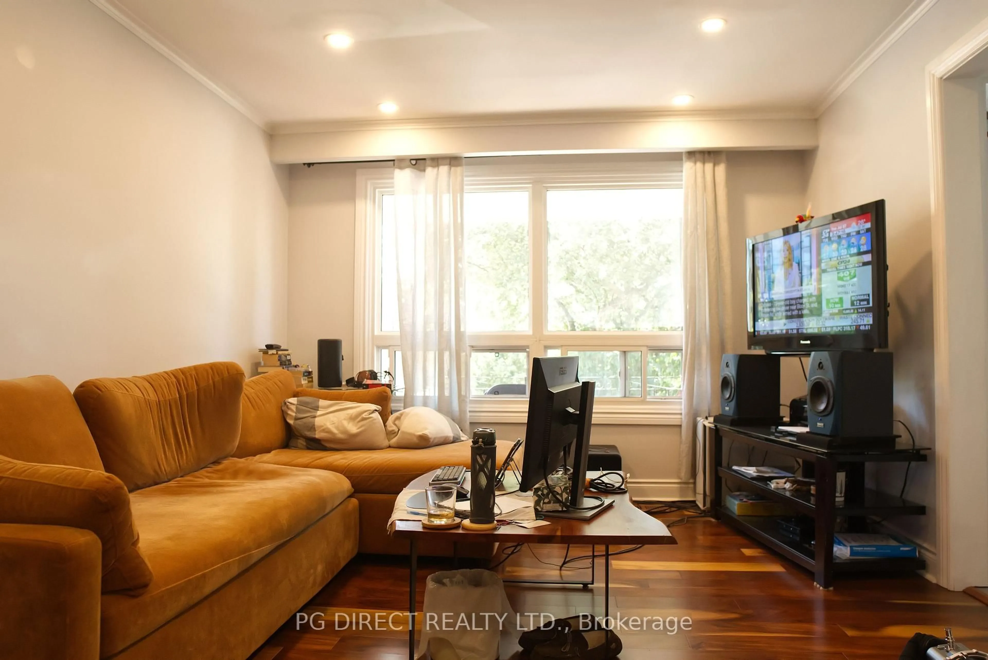 Living room with furniture, wood/laminate floor for 5A Scotia Ave, Toronto Ontario M1L 4E4