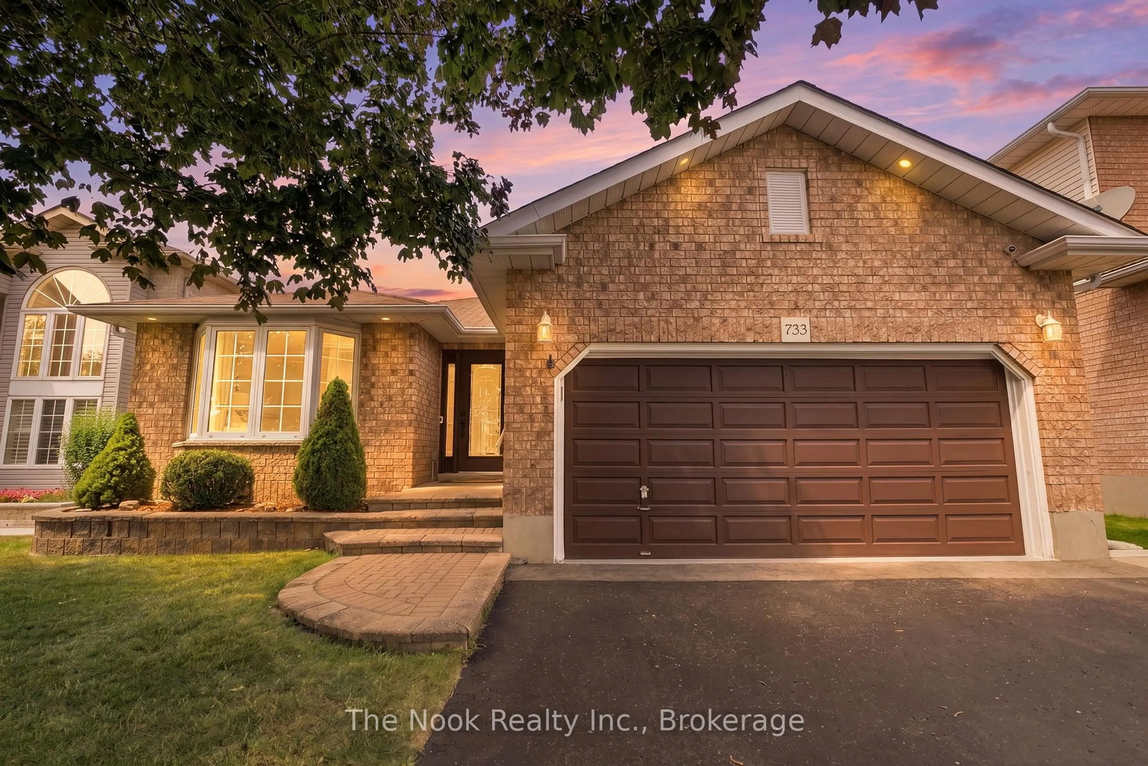 Home with brick exterior material, street for 733 Sundance Circ, Oshawa Ontario L1J 8N9